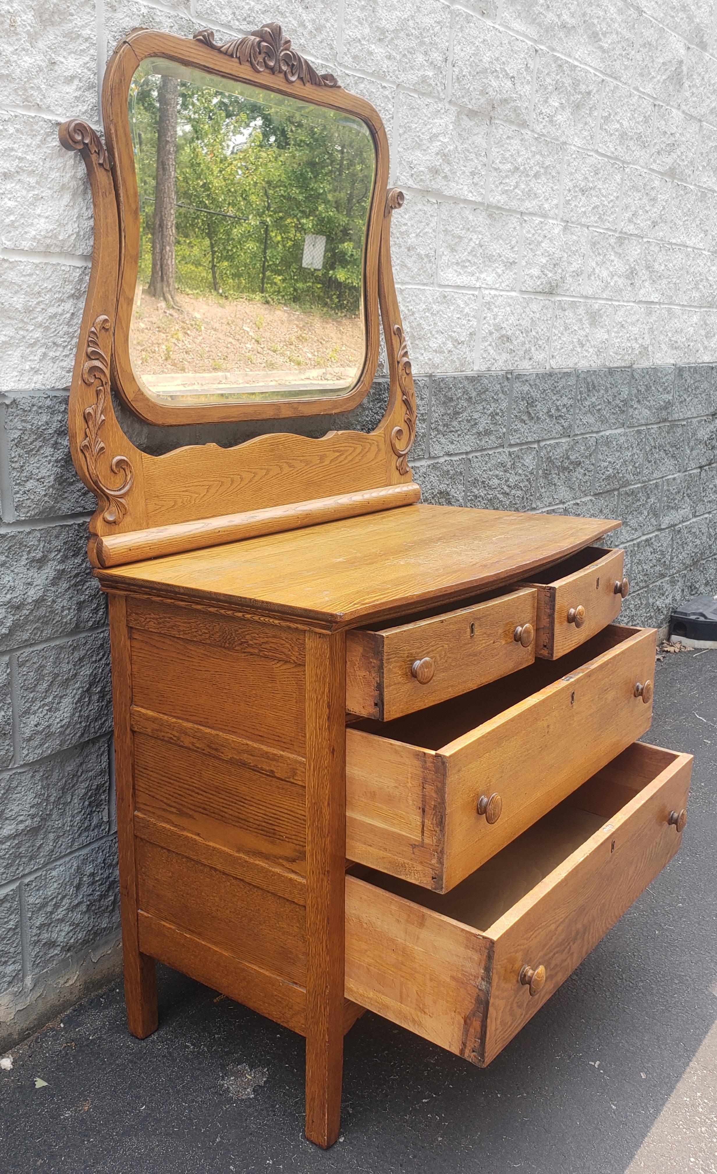 American Late 19th Century Victorian Carved Tiger Oak Dresser with Mirror  For Sale