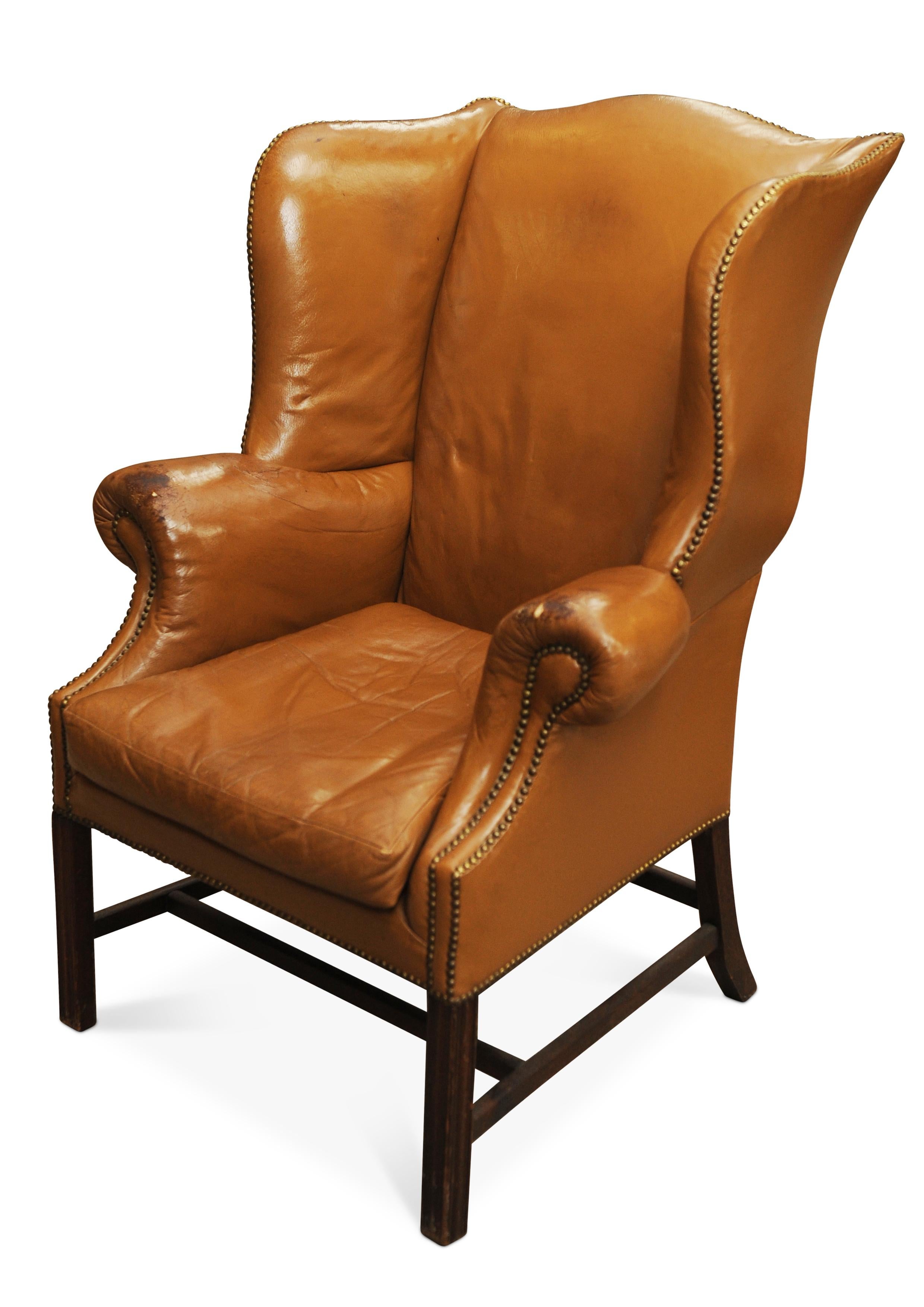 British 19th Century Georgian Mahogany And Tan Leather Wing Back Armchair  For Sale