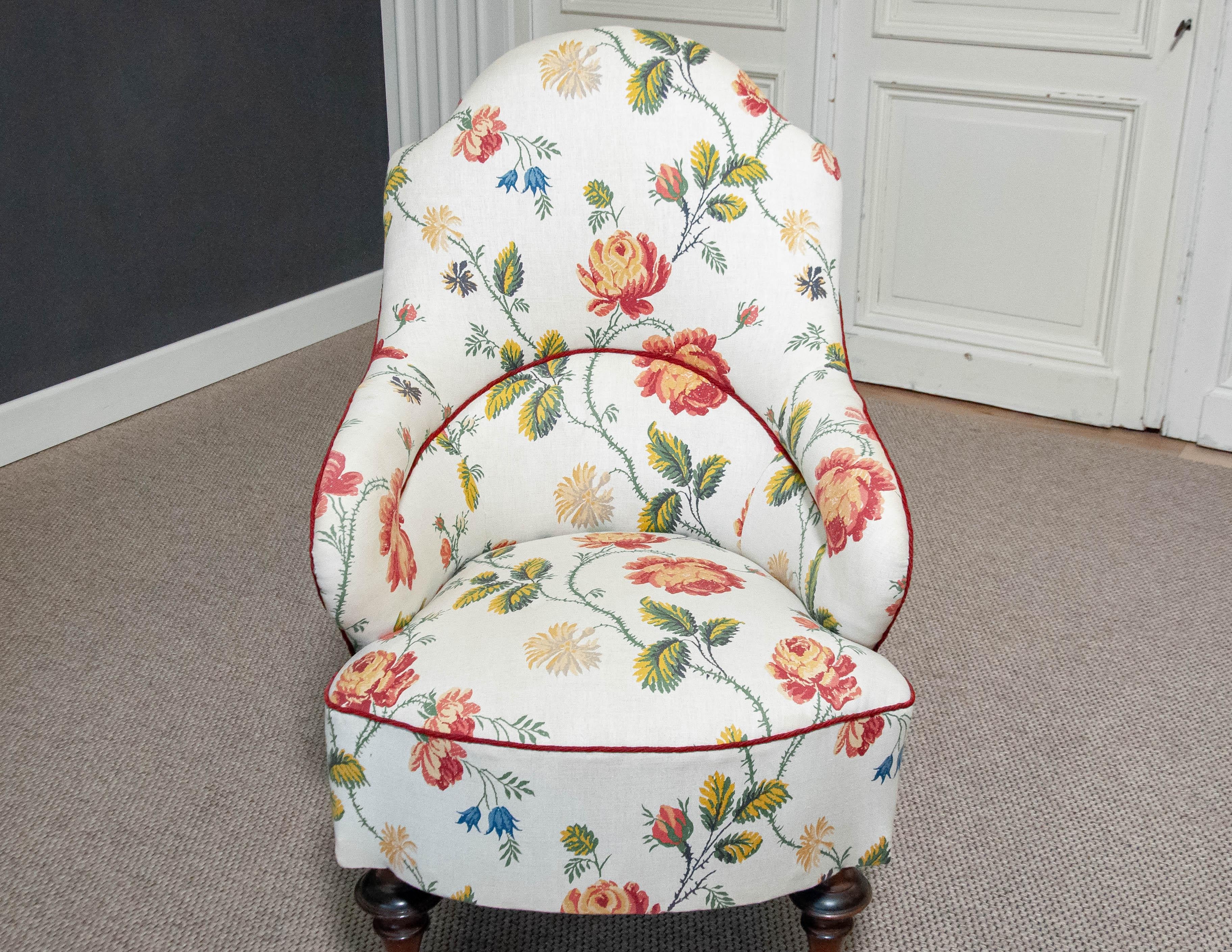 This is a Victorian nursing/lounge chair from Sweden, dating back to the late 19th century. This elegant chair feature beautifully turned beech wood legs, showcasing classic Victorian craftsmanship. The chair is later reupholstered in the 1980s with
