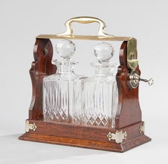 Tantalus vittoriano di fine Ottocento in Oak e cristallo realizzato da Army & Navy CSL