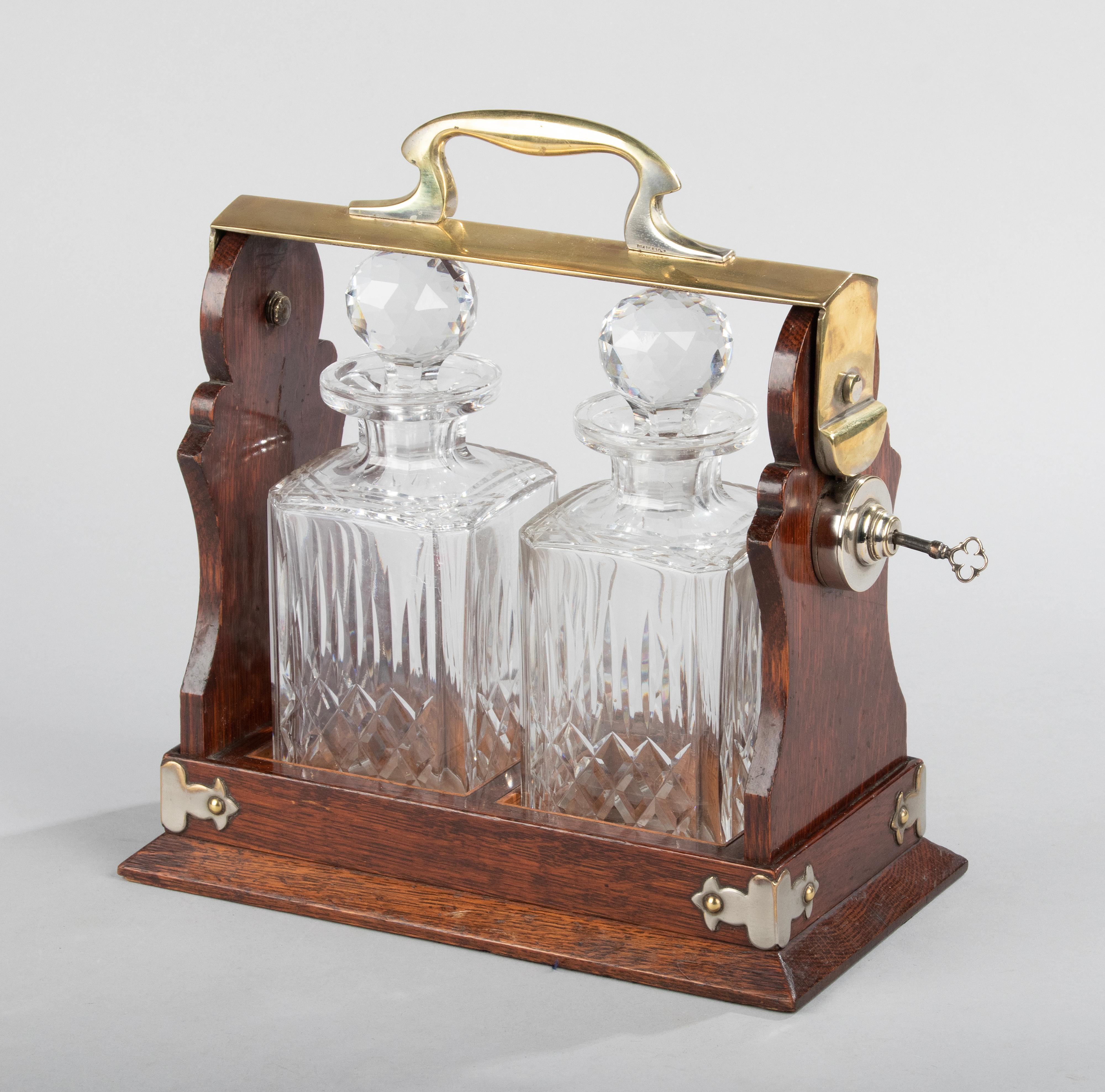 British Late 19th Century Victorian Oak and Crystal Tantalus Made by Army & Navy CSL For Sale