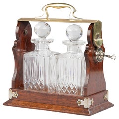 Late 19th Century Victorian Oak and Crystal Tantalus Made by Army & Navy CSL