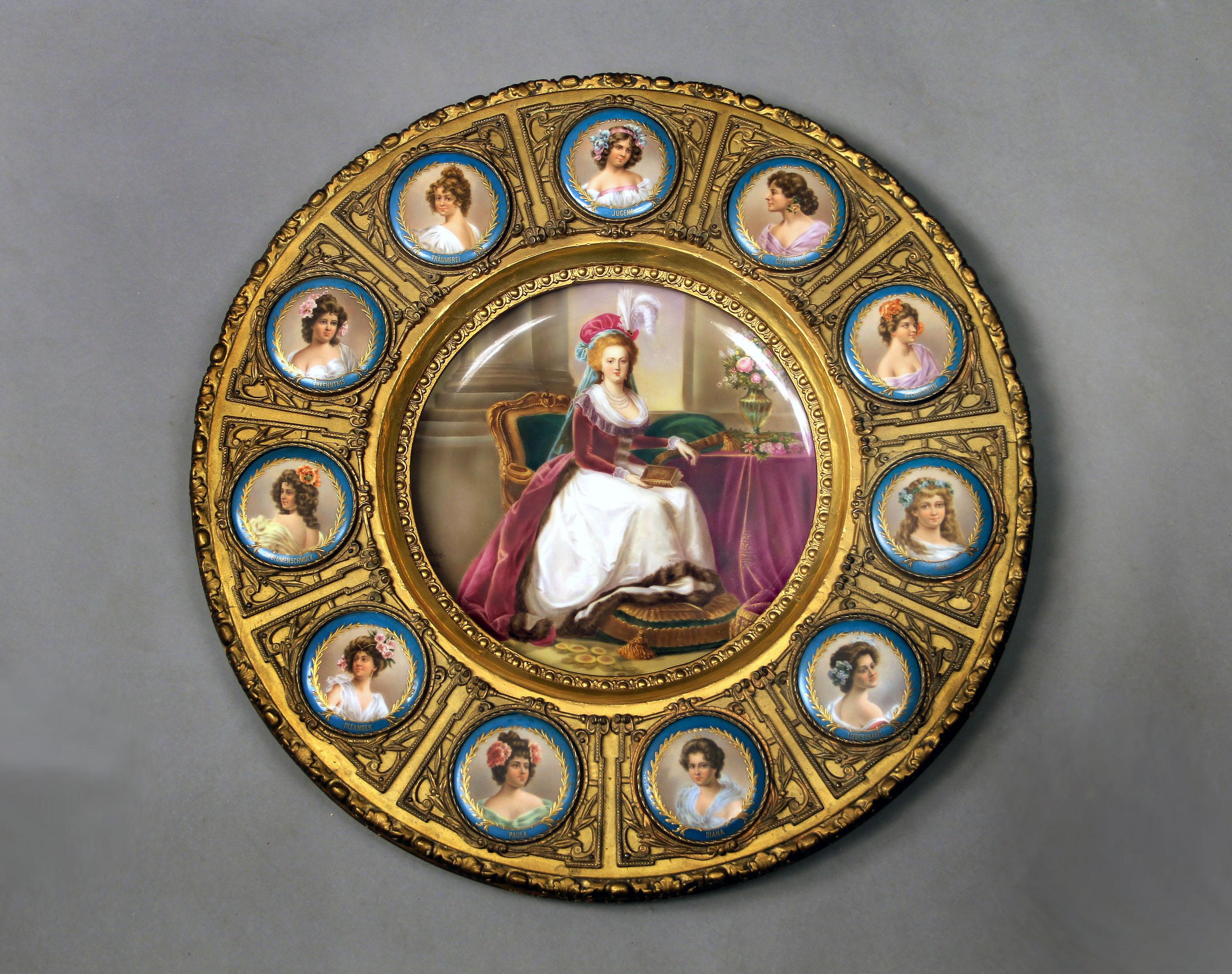 Late 19th Century Vienna Porcelain Mounted Giltwood Frame Signed J. Feigl 1888

Signed J. Feigl 1888

With a central portrait plaque depicting Marie Antoinette, within a border of smaller portrait plaques depicting her ladies of court.