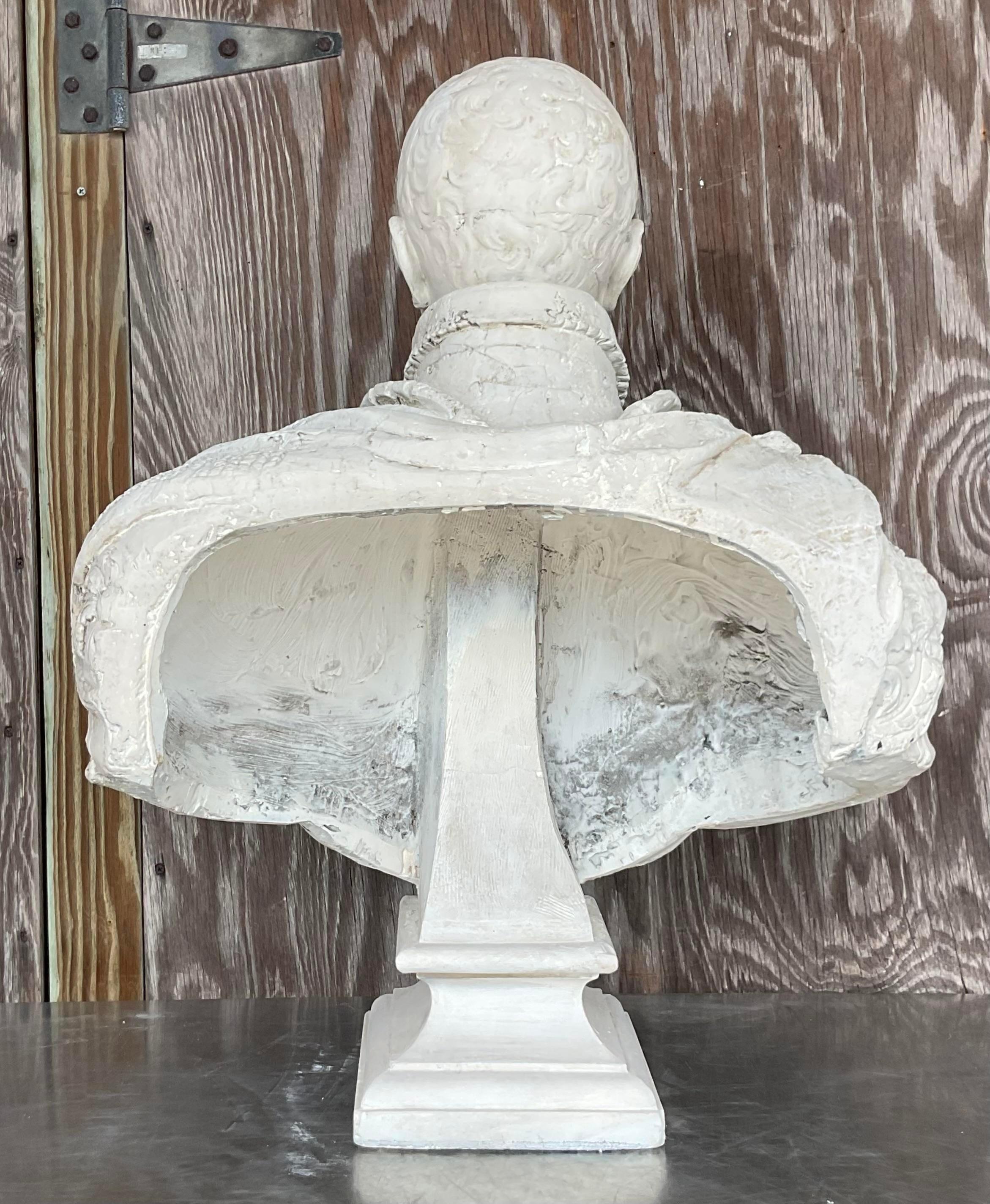 Infuse your space with eclectic charm using this vintage boho plaster bust of a Moorish man. Crafted with intricate detail and bohemian flair, this piece adds a touch of cultural intrigue to any room. Perfect for collectors of unique art or those
