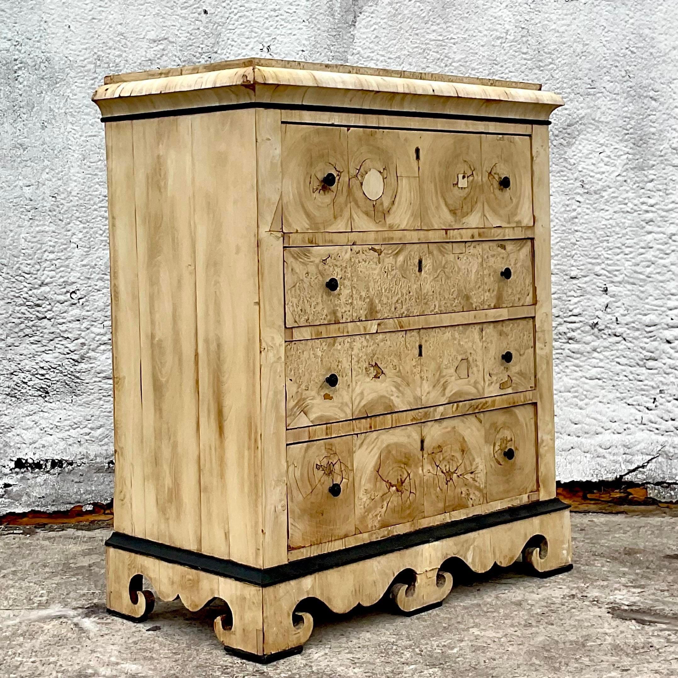 A stunning vintage English Colonial chest of drawers an incredible distressed and bleach finish on a Burl wood cabinet. Gorgeous wood grain detail. A really special piece. Acquired from a Palm Beach estate. 