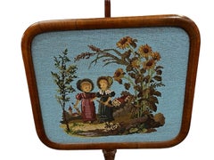 Late 19th Century Walnut and Beaded Fire Screen with Petit Point Faces