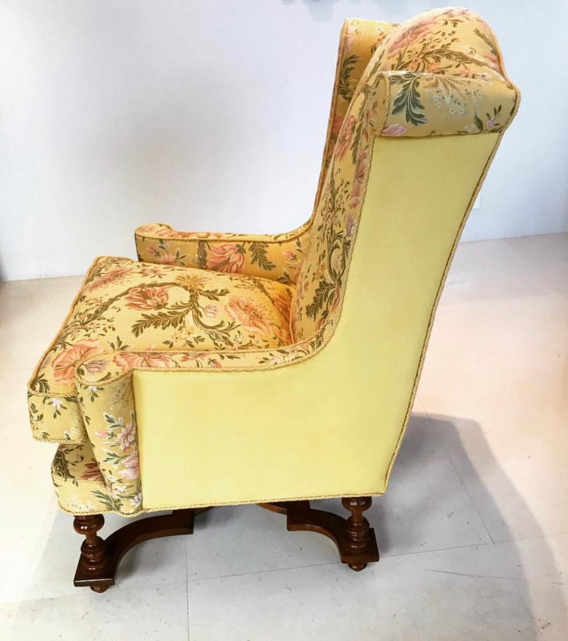 Very comfortable English wingback armchair with goose feathers cushioned seat above walnut legs. Upholstered in fine Venetian Bevilacqua silk velvet and silk brocade.