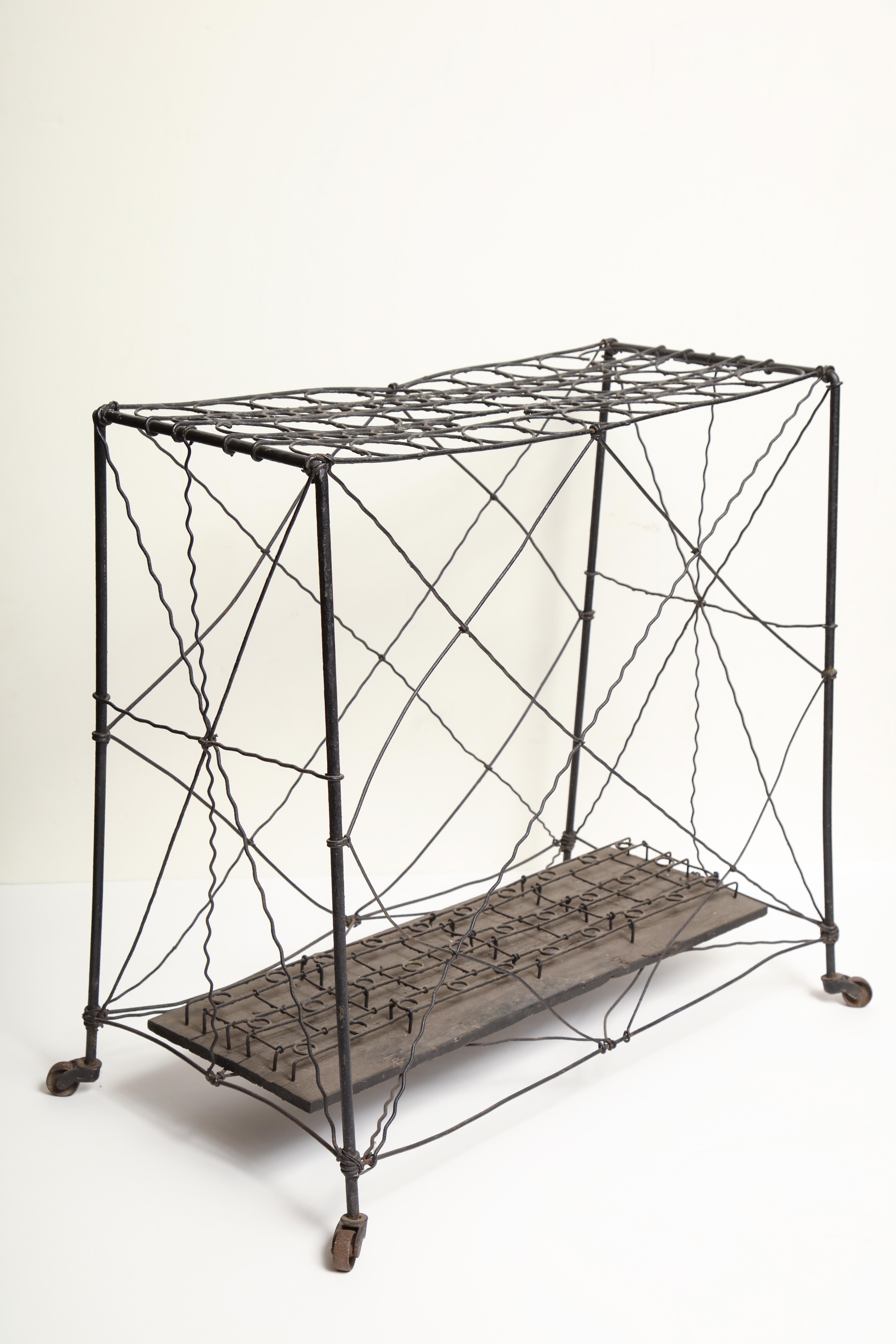 Late 19th century, wire cane rack.