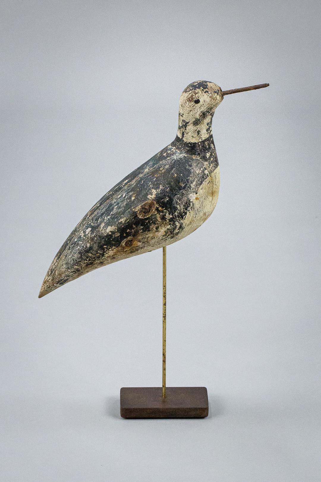 Late 19th century working shorebird decoy found in his original painted finish, unusually with his original iron beak, France, circa 1890. Later bespoke stand, measurement not inc stand.