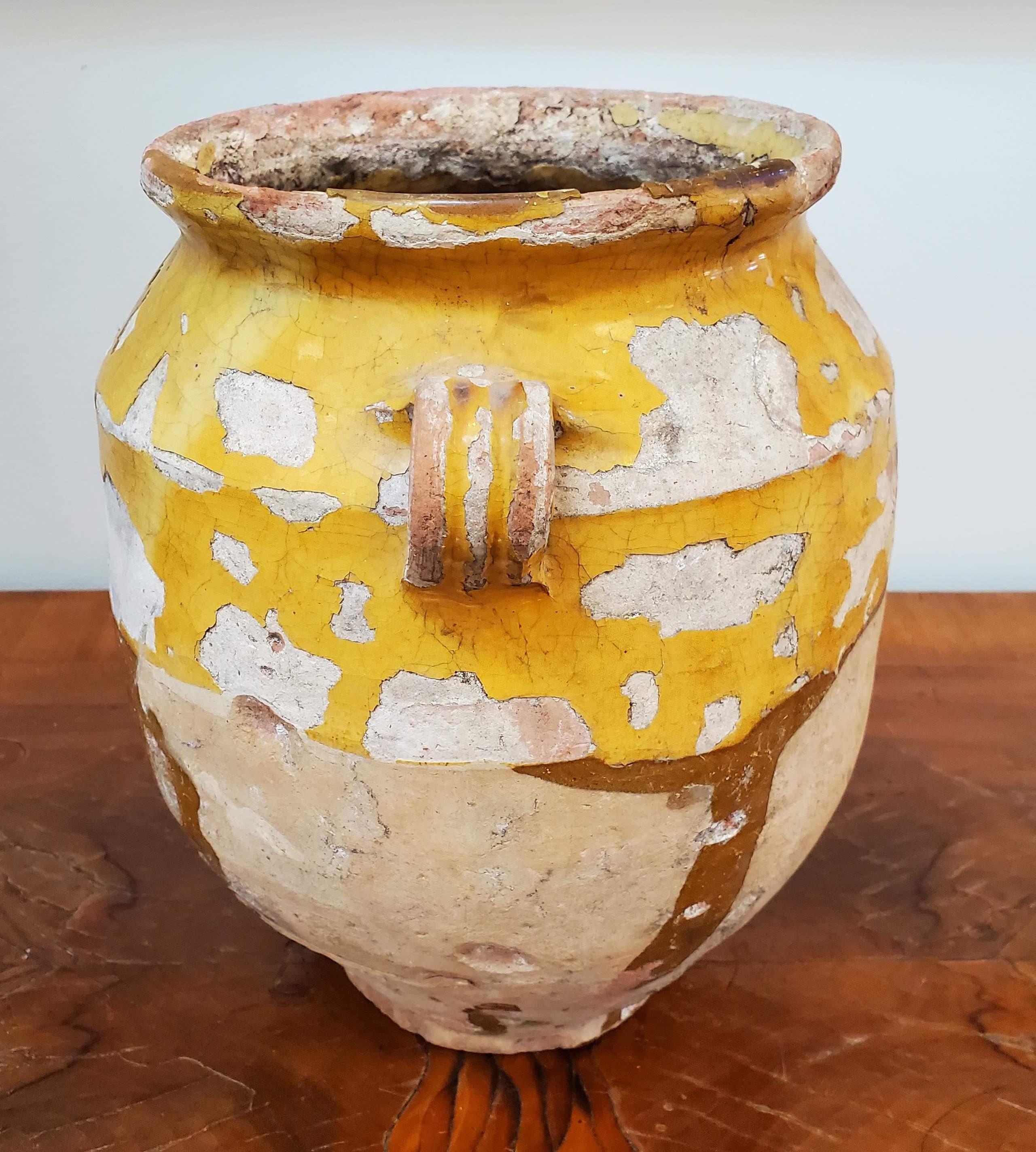 19th Century Yellow Glazed Terra Cotta “Confit” Pot. 
Provence, circa 1880.
Measures: 10.5” H 8” Dia

 