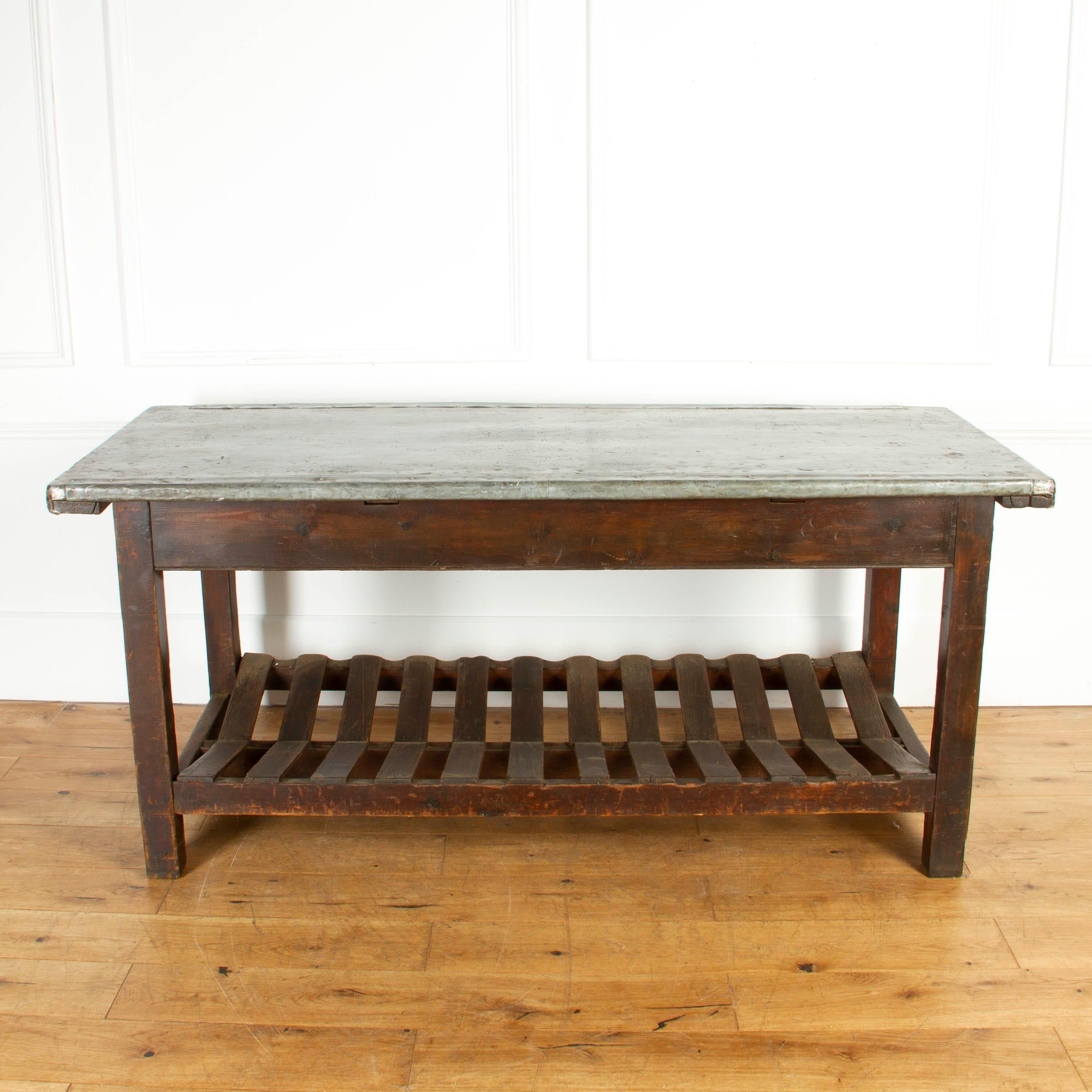 Attractive late 19th century zinc top table, circa 1880.

Originally from Yorkshire, this would have been used as a mending table within a traditional woolen mill. 

It has its original top and structure which are both in fantastic condition.