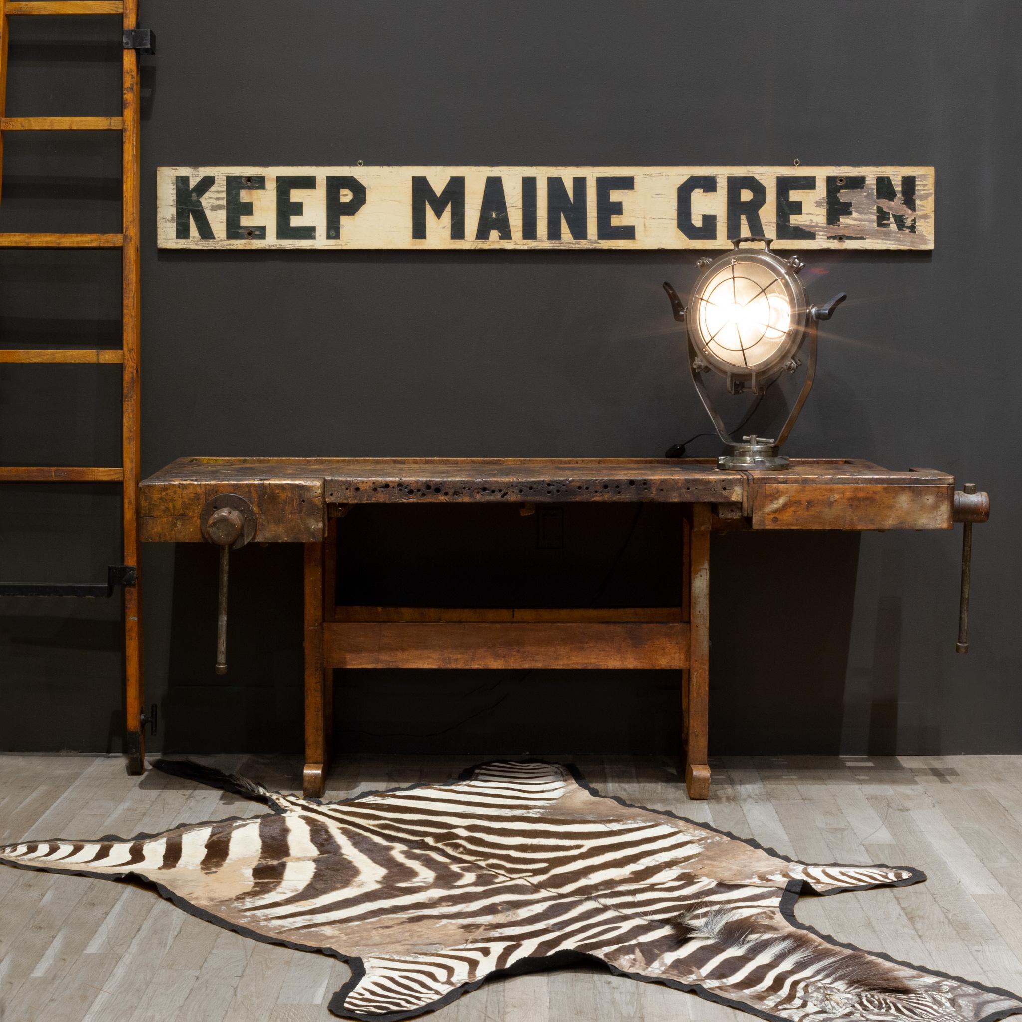 ABOUT

A beautifully worn and well used, solid Maple carpenter's workbench with steel accents in the front, large inlay tray used to house larger tools and two wooden screw vises with steel handles that work properly and extend out. Original label