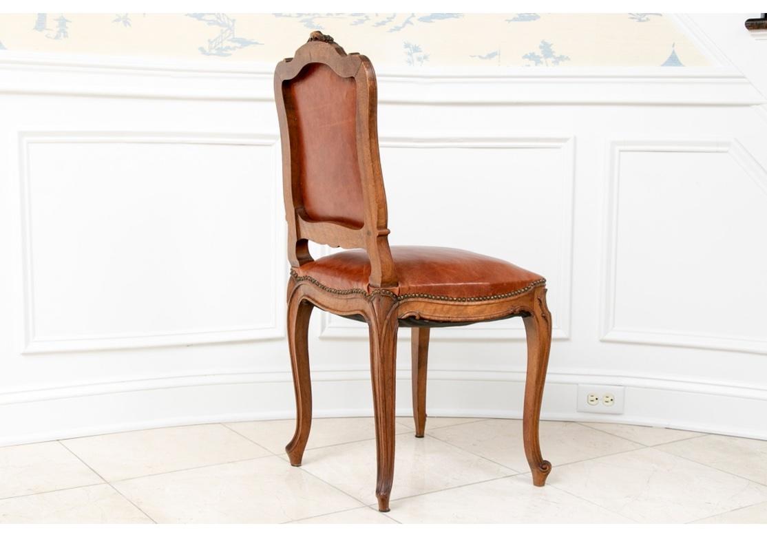 Louis XV Late 19th-Early 20th C. Set of 14 French Leather Upholstered Dining Chairs For Sale