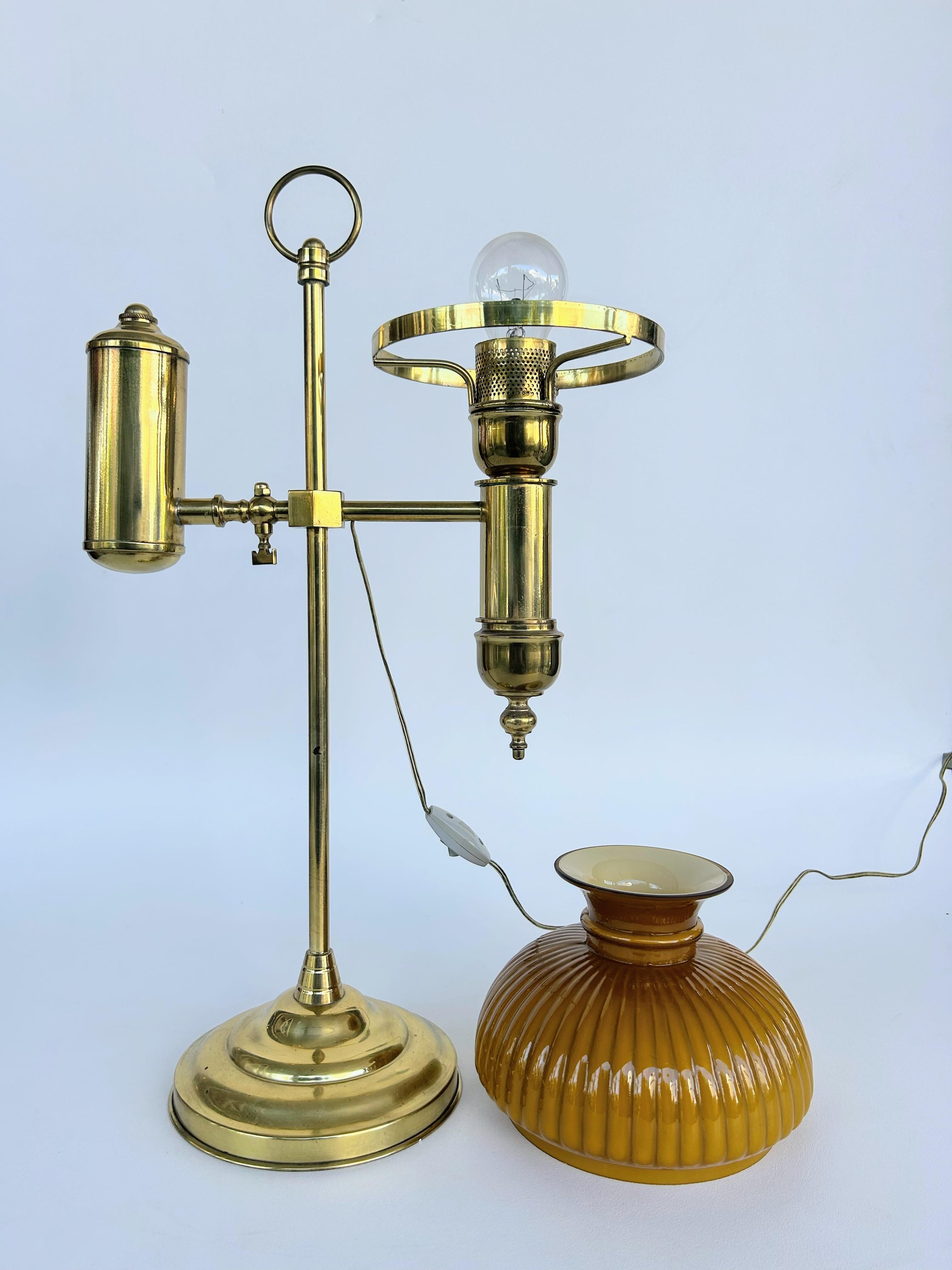 Late 19th-Early 20th Century Brass, Glass Library Lamp with Glass Shade

Offered for sale is a late 19th or early 20th-century brass and glass library lamp with a fluted glass shade. The lamp is fitted with an inline switch in the cord.
