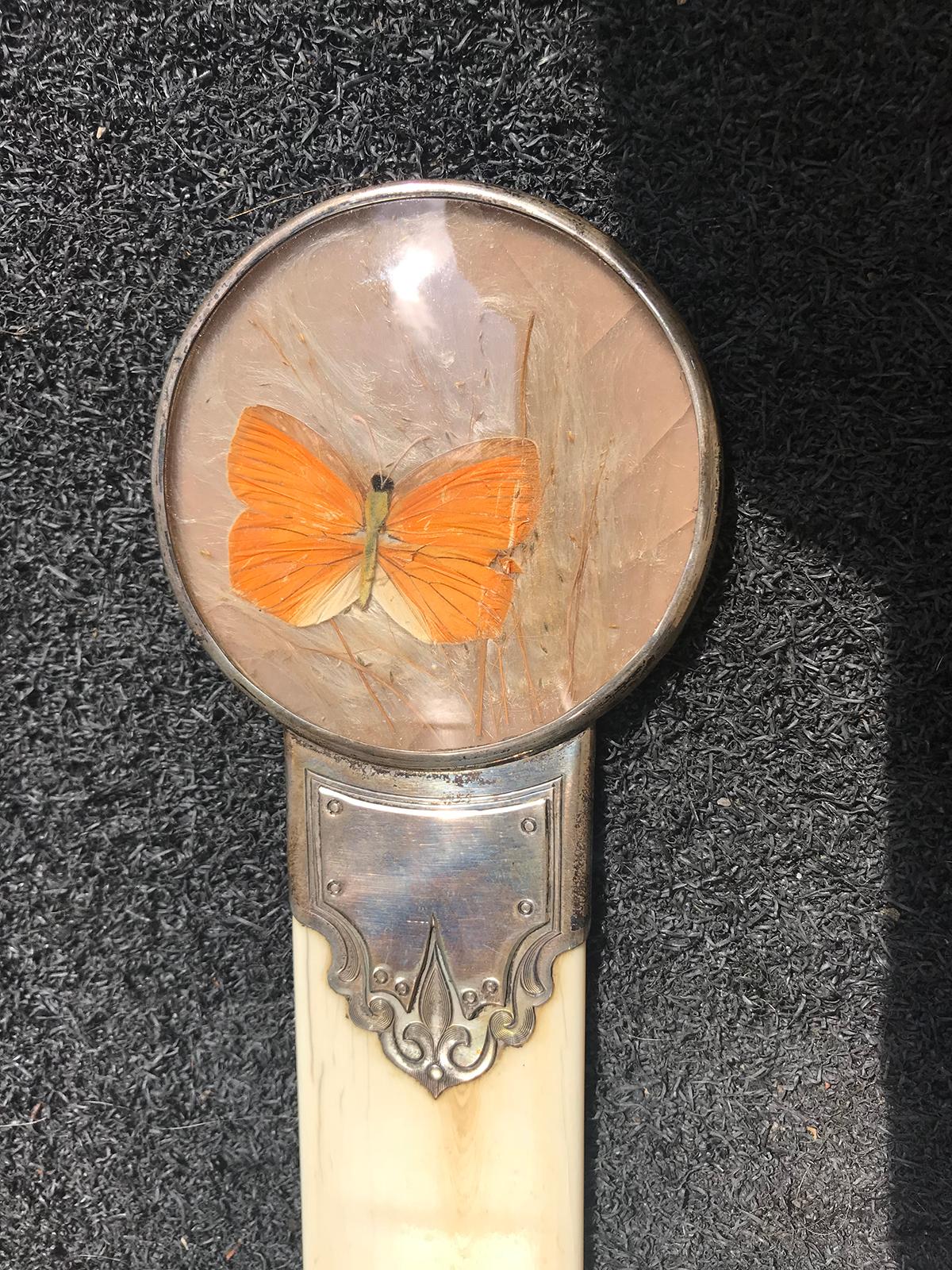 Late 19th-early 20th century English sterling silver page turner with magnifying glass butterfly.