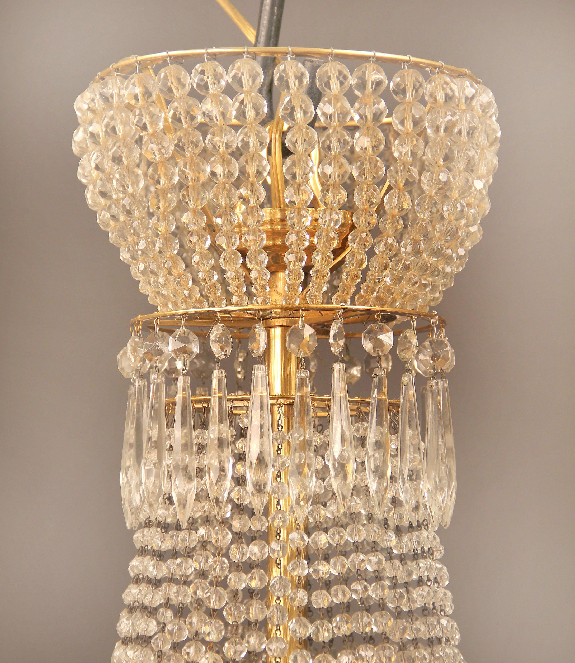 French Late 19th/Early 20th Century Gilt Bronze and Beaded EightLight Basket Chandelier For Sale