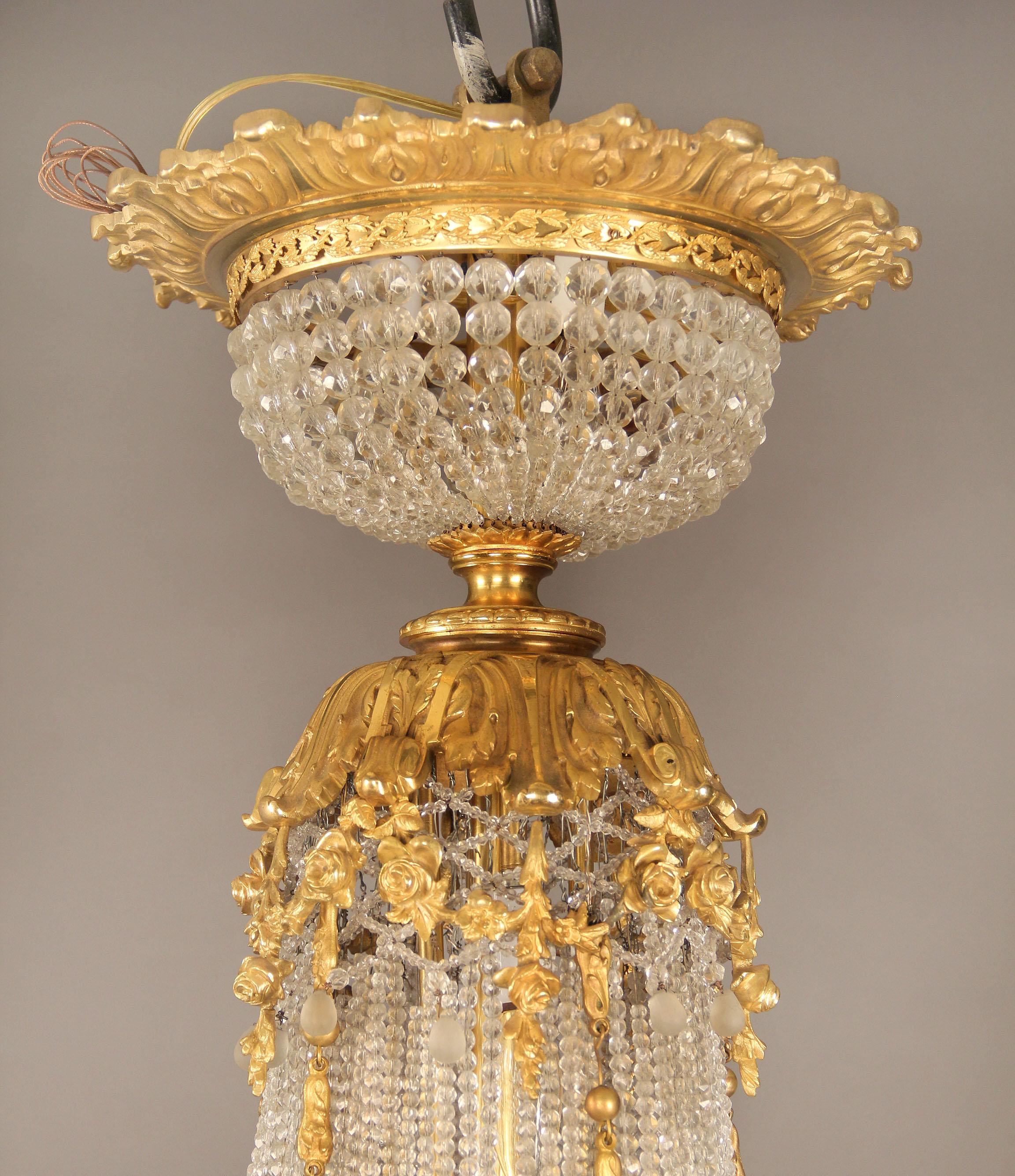 Belle Époque Late 19th/Early 20th Century Gilt Bronze and Beaded Twenty Light Chandelier in vendita