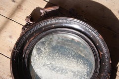 Late 19th Early 20th Century Gothic Ebonised Foxed Oxidised Convex Mirror