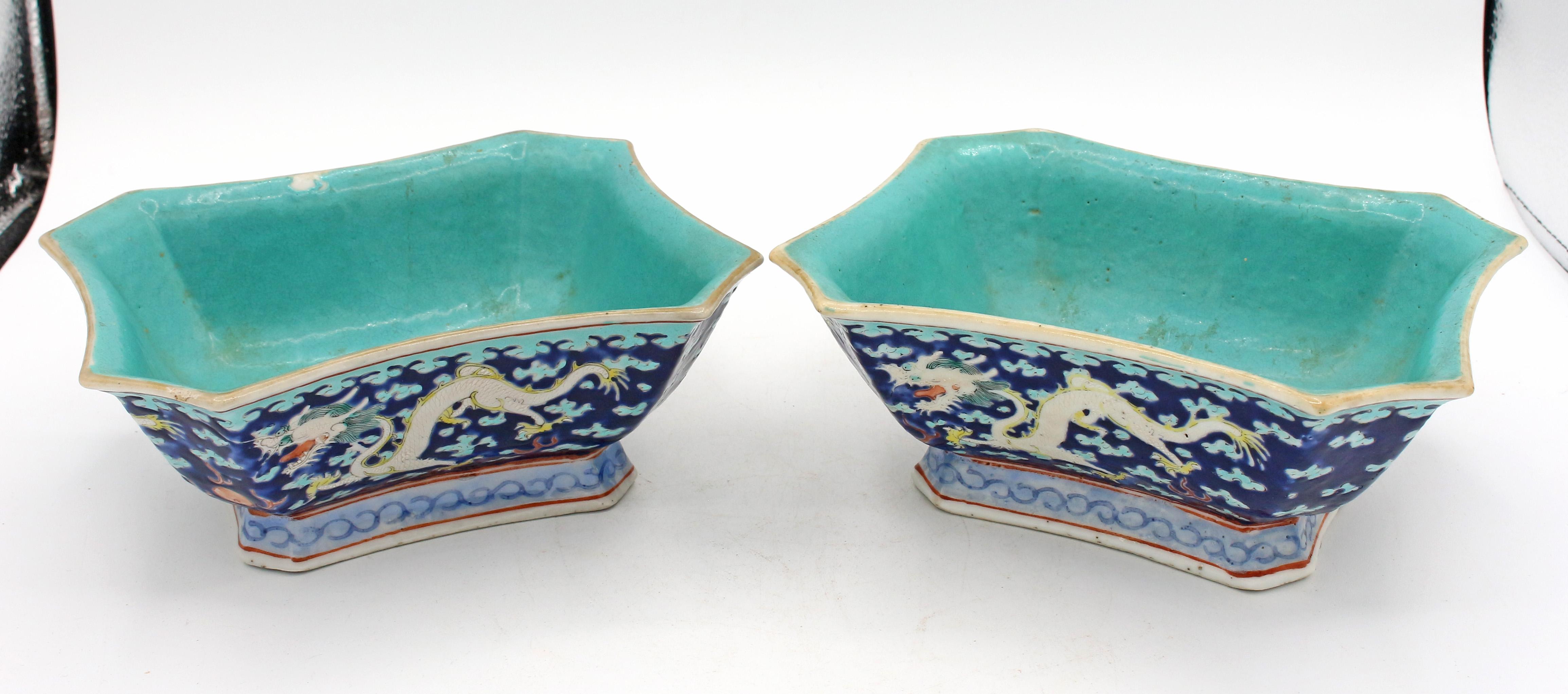 Late 19th-early 20th century Pair of Stacking Shaped Rectangular Bowls, Chinese. Cobalt ground with dragon decoration. Turquoise bowl, bottom & border. Original turquoise glaze miss spot on one; also with small rim chip. Fine enamelling & incising