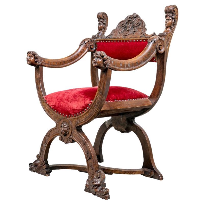 Fin 19e/début 20e siècle Chaise à accoudoirs Savonarola de style Renaissance 