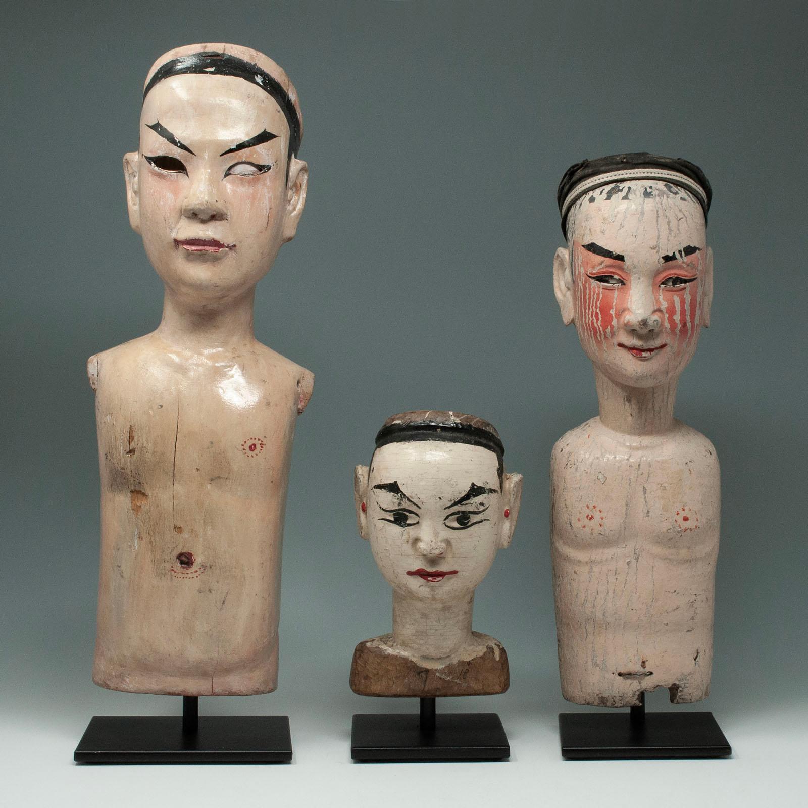 Late 19th to early 20th century Trio of puppets, China

Two puppet torsos and one puppet head from China, all mounted on custom bases. The heights are 16, 9 and 13.5 inches (40.6, 23 and 34.2 cm).
Ex private Mendocino collection.


