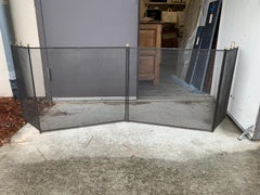 Late 19th-Early 20th Century Unusual Four-Panel Firescreen with Brass Accents