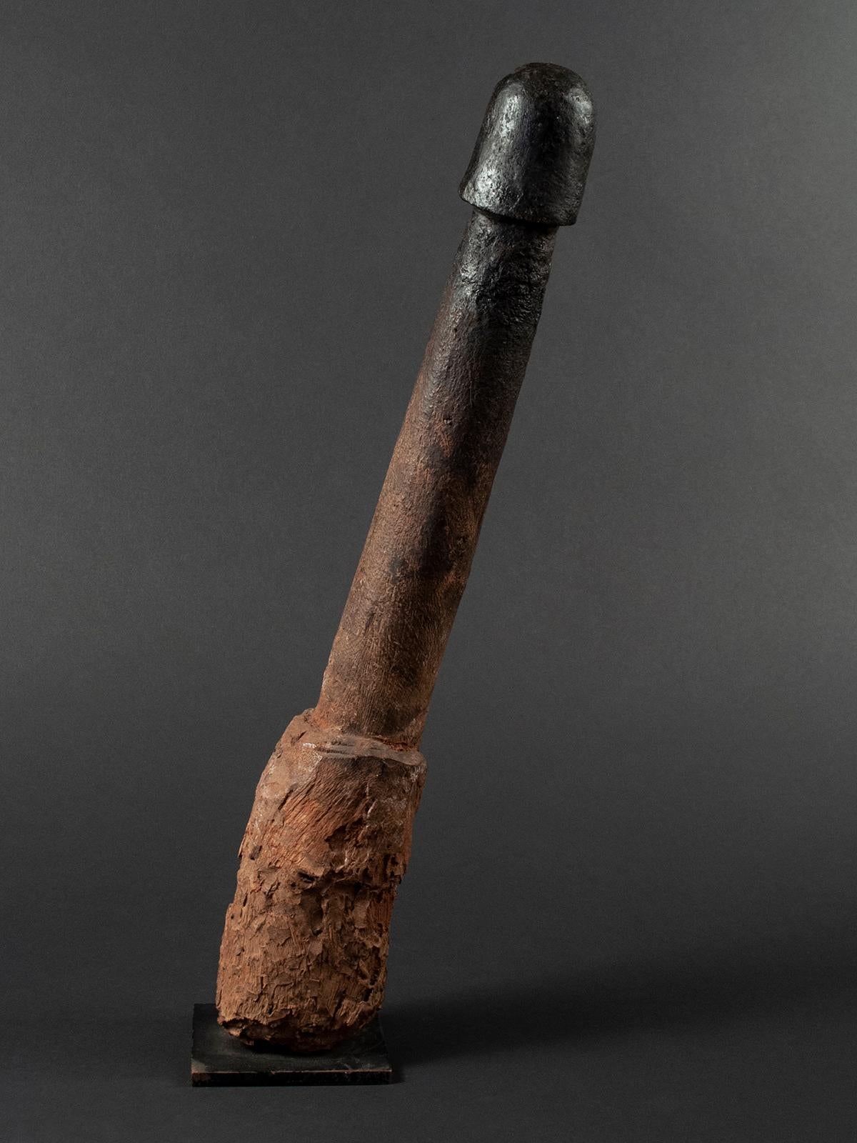 Late 19th-early 20th century wood Legba phallus, Fon people, West Africa

A large carved hardwood phallus from the Fon tribe on the border of Togo and Ghana. These are called Legba, named after a deity, and were placed in the ground to stimulate the