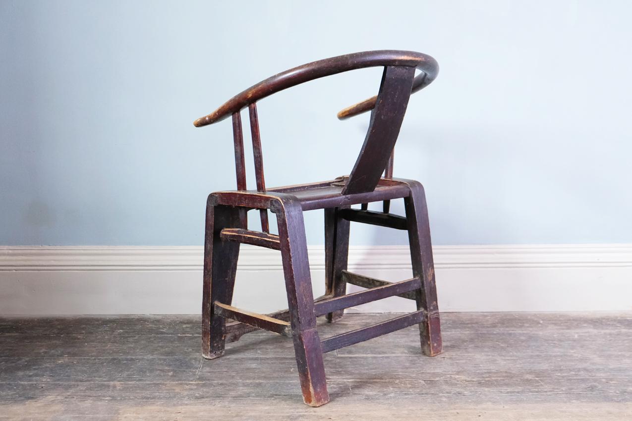 Carved Late 19th or Early 20th Century Chinese Horseshoe Armchair For Sale