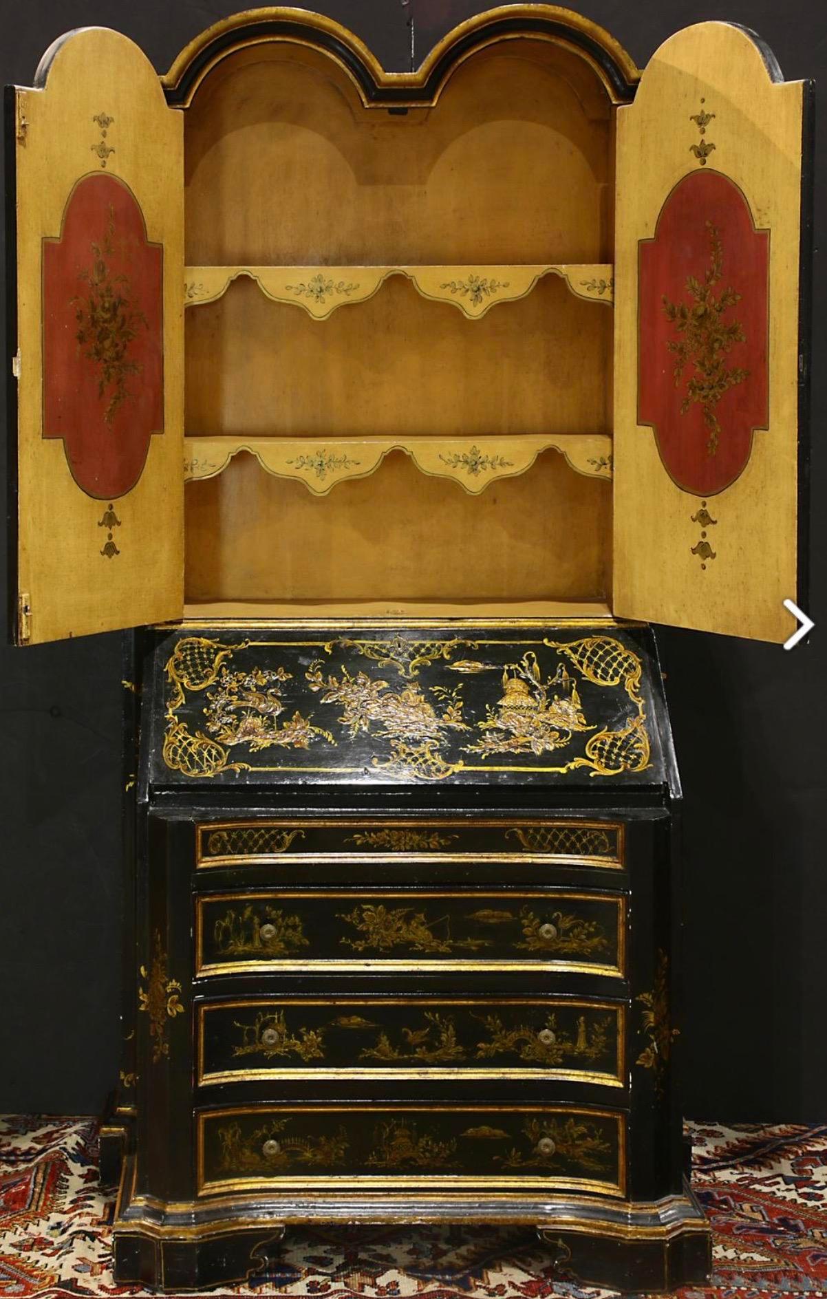 Late 19th-early 20th century George II style chinoiserie drop front secretary, circa 1900

An outstanding example of late 19th century chinoiserie decorated furniture

A rich ebonized background decorated with gilded scenes

The top cabinet