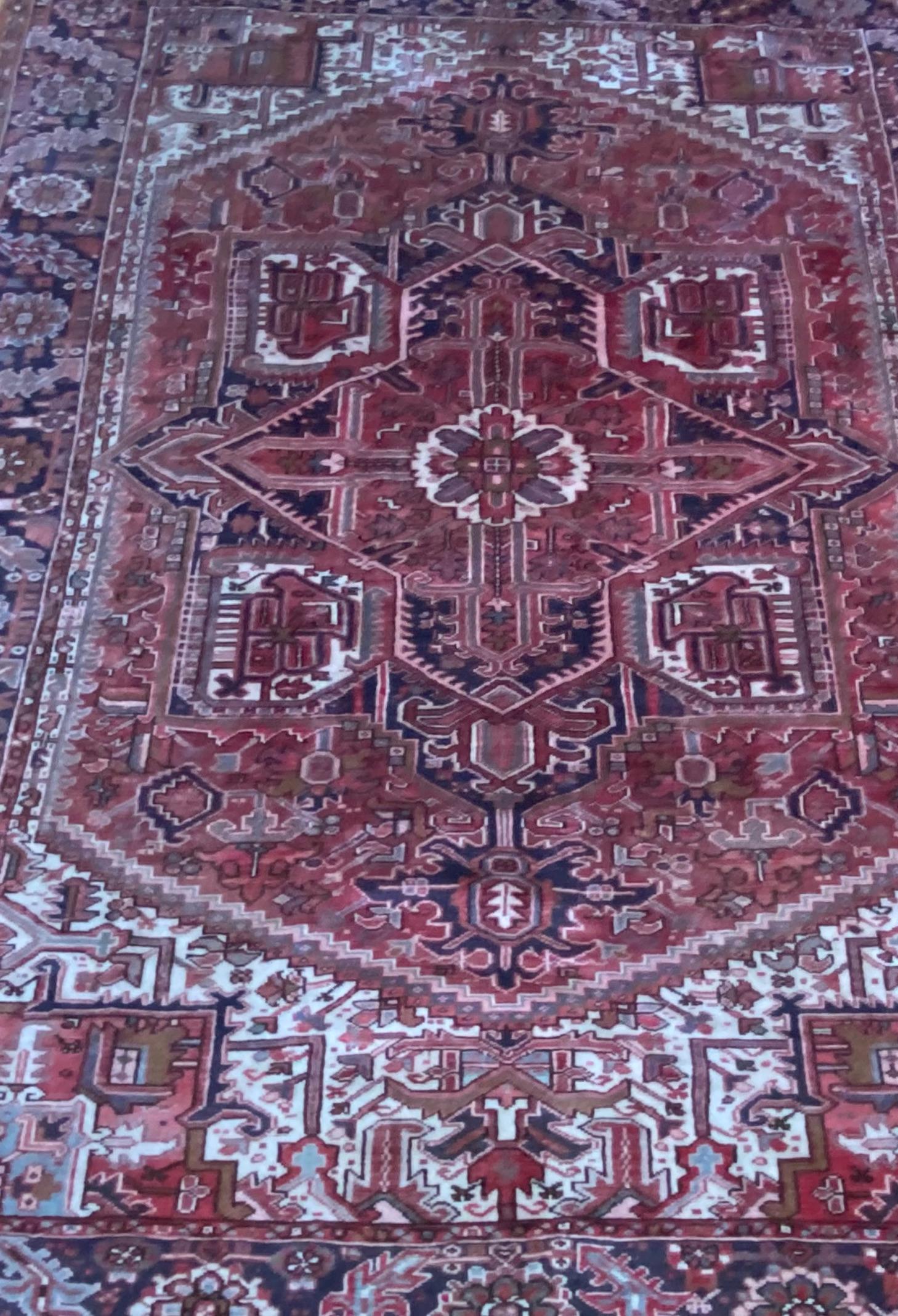 Late 19th to early 20th century Persian rug

Gorgeous antique Persian rug in a rich oxblood red color with dark blues and whites

The rug measures 8 feet 6 inches wide x 11 feet 2 inches long

We are unsure of the materials used

The rug is