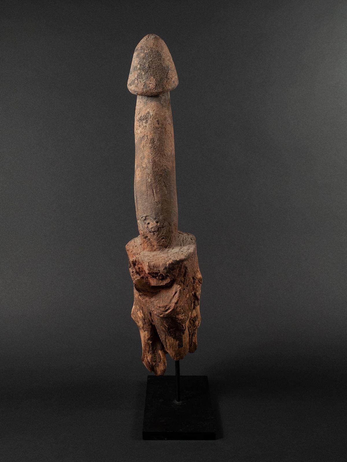 Late 19th-early 20th century wood Legba phallus, Fon people, West Africa

A very large carved hardwood phallus from the Fon Tribe on the border of Togo and Ghana. These are called Legba, named after a deity, and were placed in the ground to