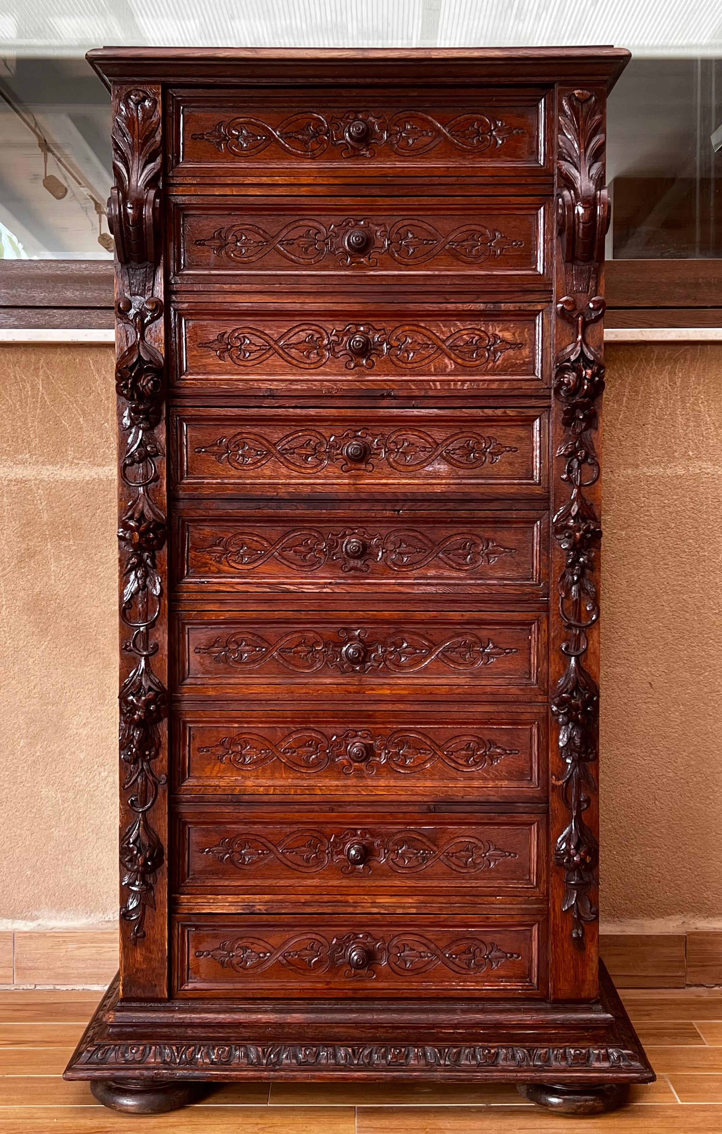 Spanish Colonial Late 19th Walnut Nine Drawer Tall French Carved Chest or Siffonier For Sale