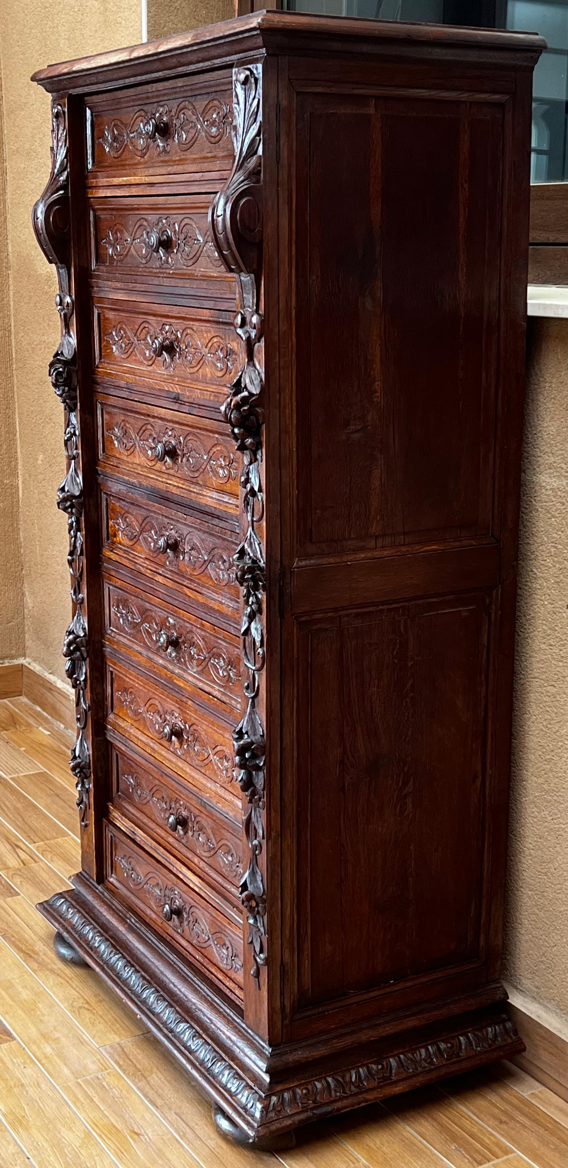 Hand-Carved Late 19th Walnut Nine Drawer Tall French Carved Chest or Siffonier For Sale