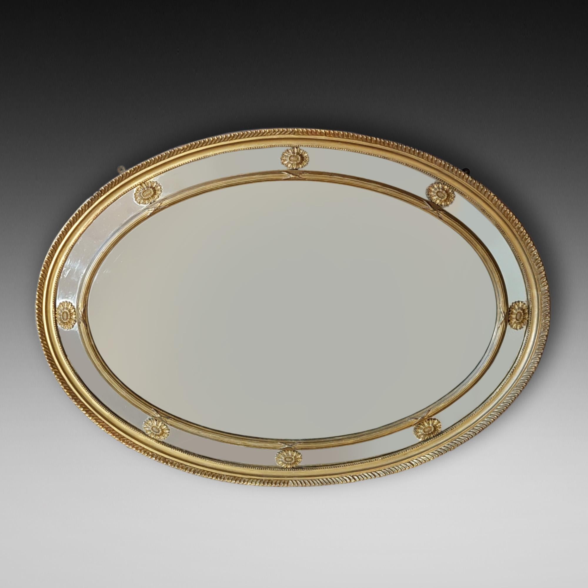 Specchio in stile Regency della fine del XIX secolo - con cornice e bordo in legno dorato con motivi di patere - 48 