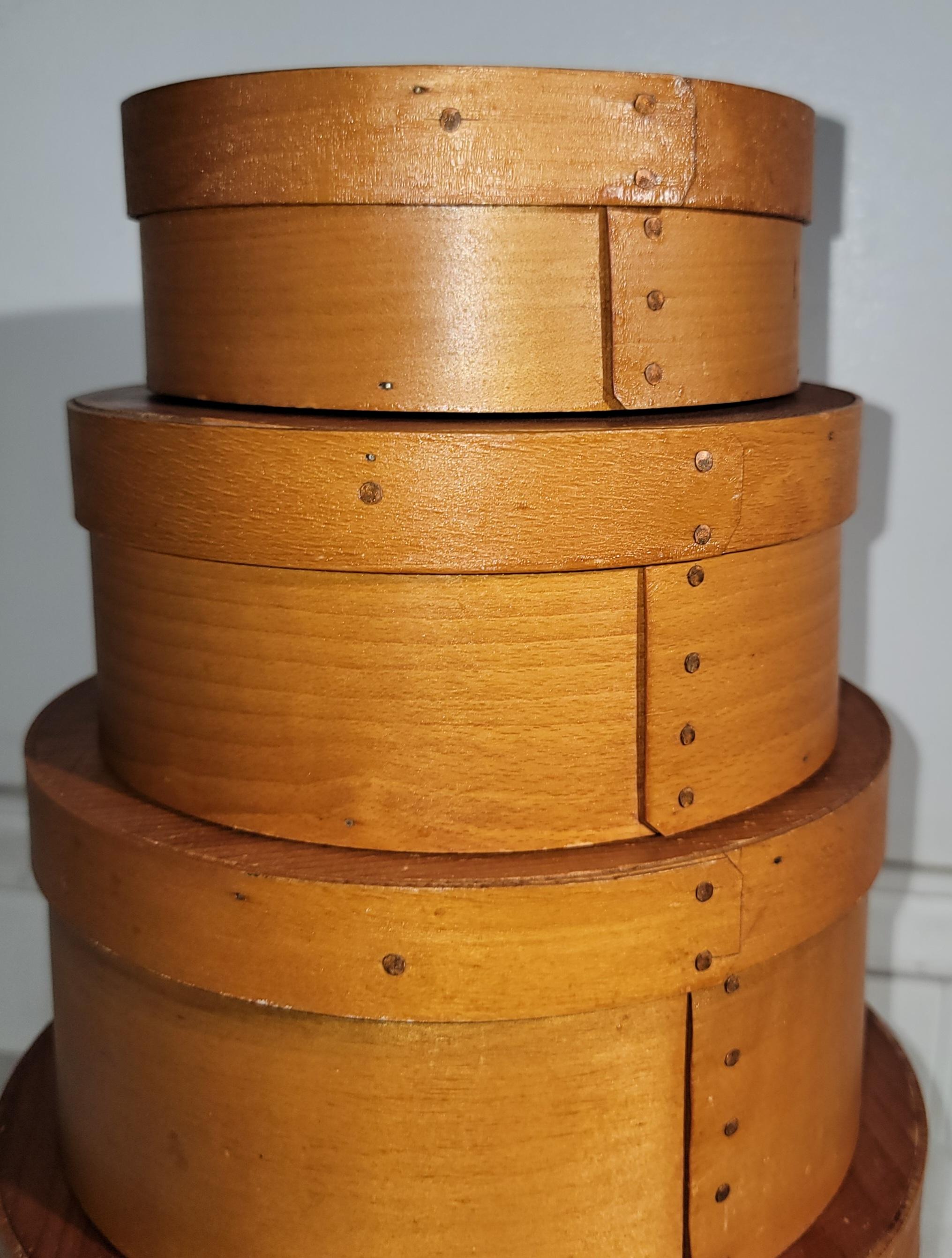 Late 19Thc Shaker pantry boxes in  fine condition and all matching stack.This matching stack of four boxes are in great condition and all have copper nail construction.Sold as a collection of four boxes.

Smallest - 6 x 2.25
largest - 9 x  4.25