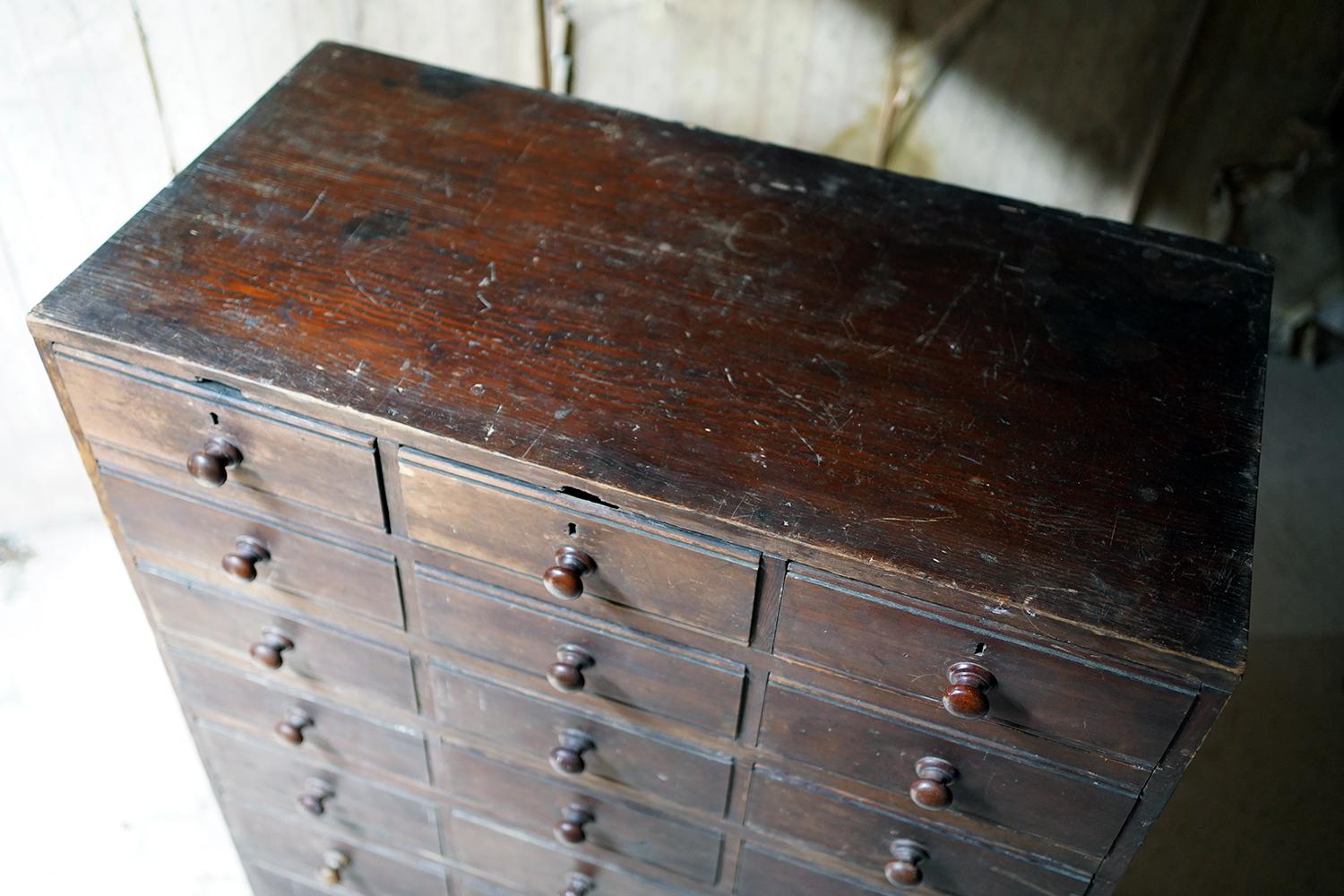 English Late 19thc Stained Pine Bank of Twenty-One Drawers, c.1890 For Sale