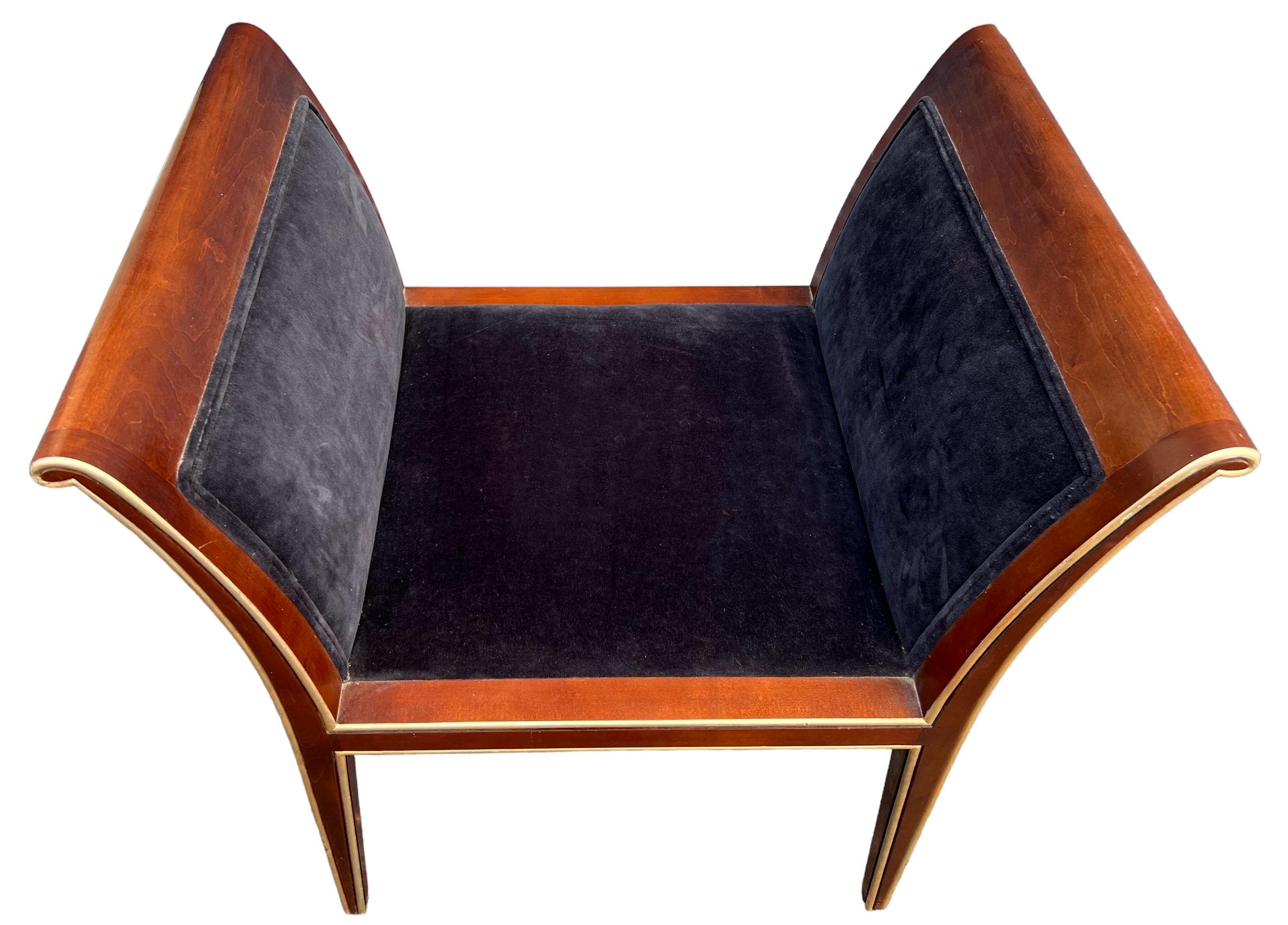 This is a handsome bench. It has Art Deco styling with its sleek mahogany frame. The vintage velvet is in very good condition. It is purported to be Italian but is unmarked.