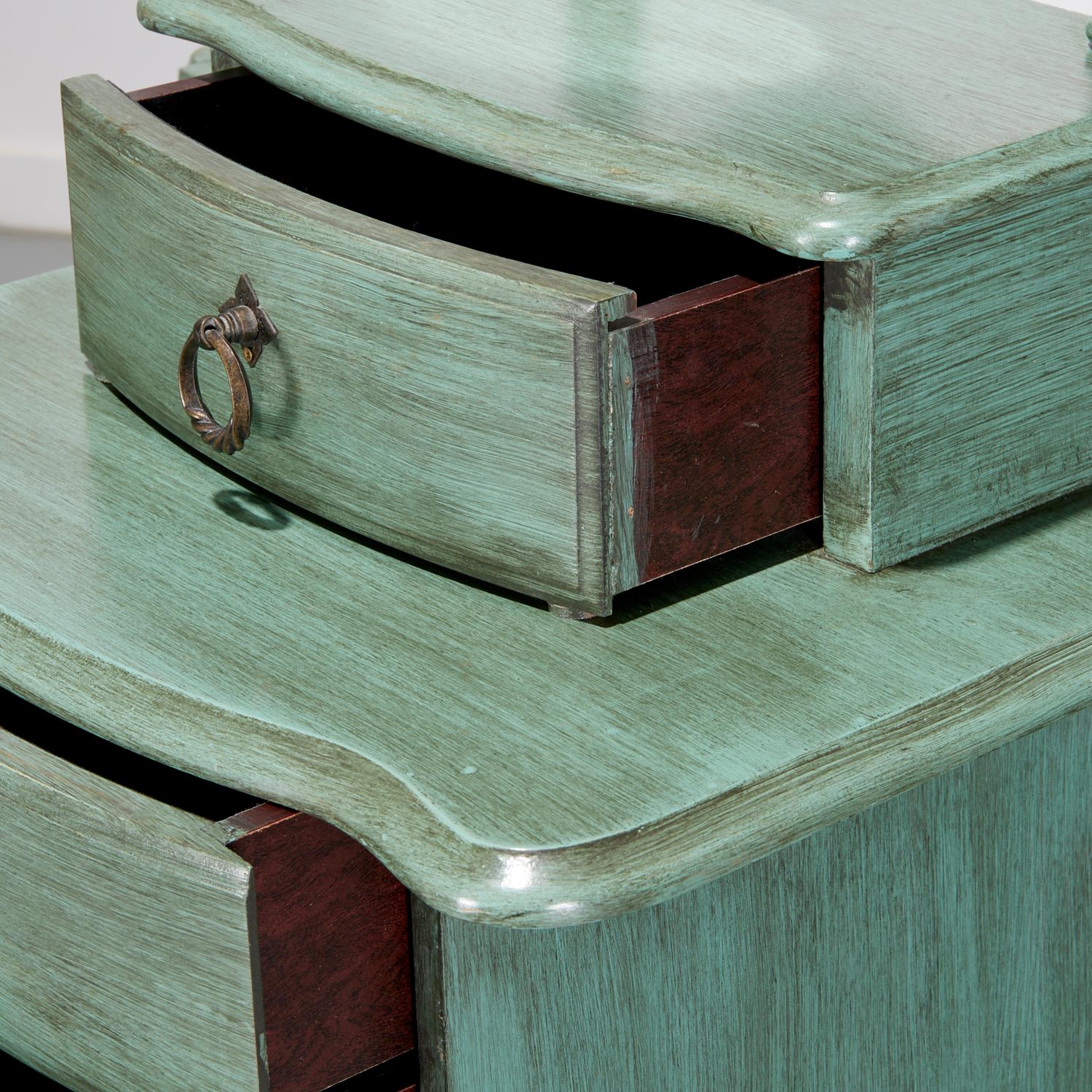 Circa. 1997,  a Powell green-painted jewelry chest on 4 carved legs, providing elegant storage and designed to hold jewelry and other small valuables. The chest is painted in a soft, muted green, often referred to as 