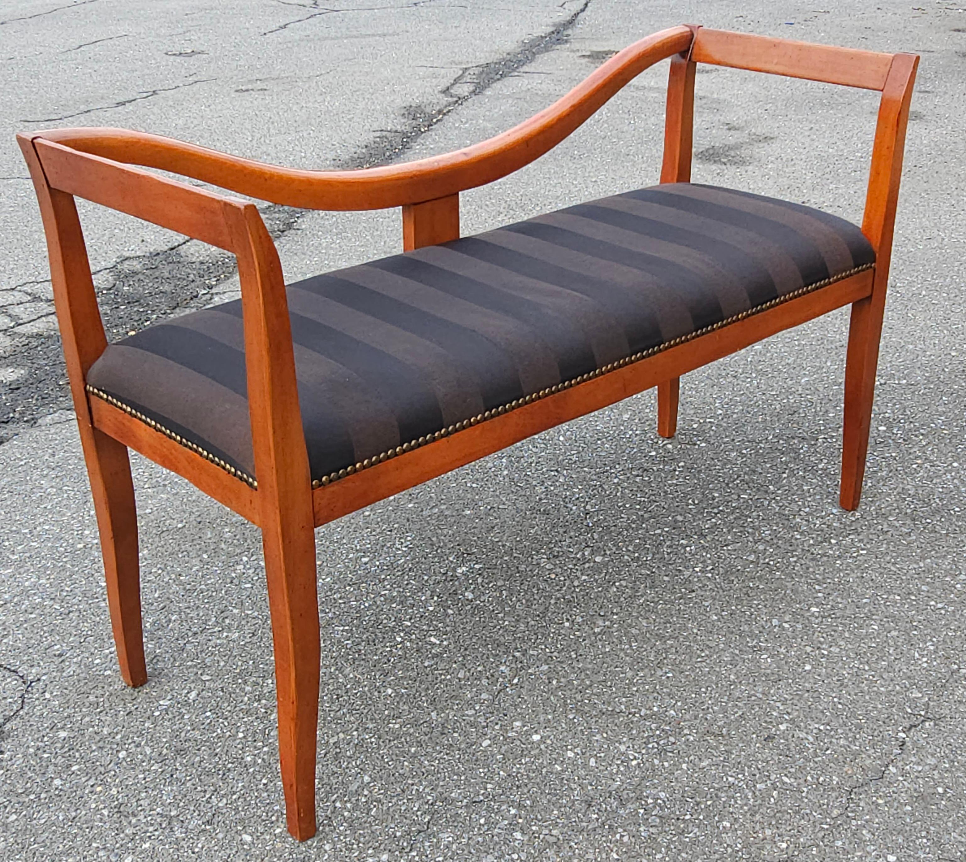 A Late 20th C. Italian Lacquered Solid Cherry and Upholstered Bench Settee with nail head trim  in great vintage condition. Measures 44