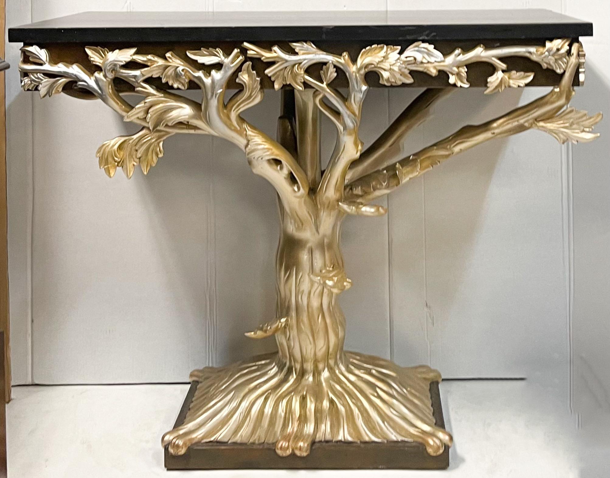 This is a late 20th century carved silver giltwood faux bois console table by J. Robert Scott. It is in very good condition.