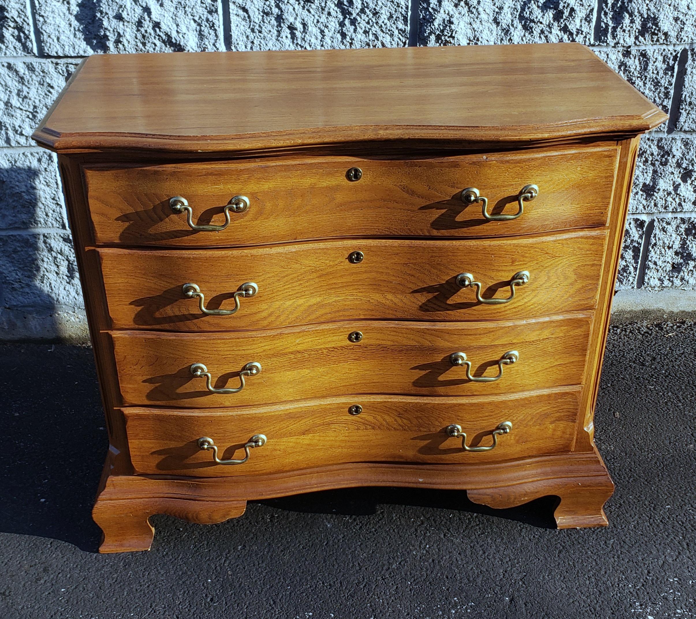 A Late 20th C. Kincaid Chippendale Solid Oak Chest of Drawers in great condition and measuring 37