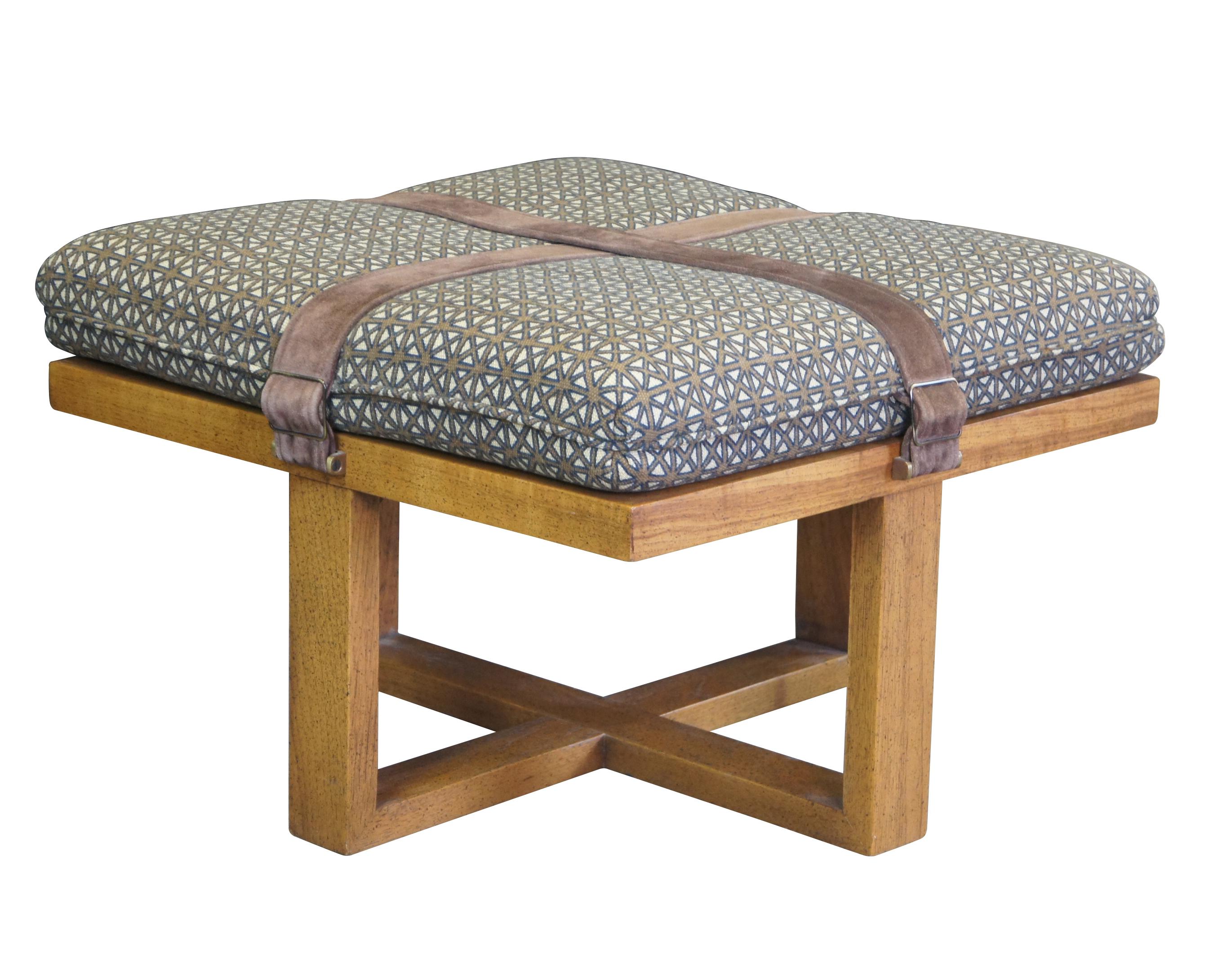 Late 20th century square ottoman with open wood base and a cushioned top finished in blue and brown lattice pattern upholstery and crossed with suede leather straps.