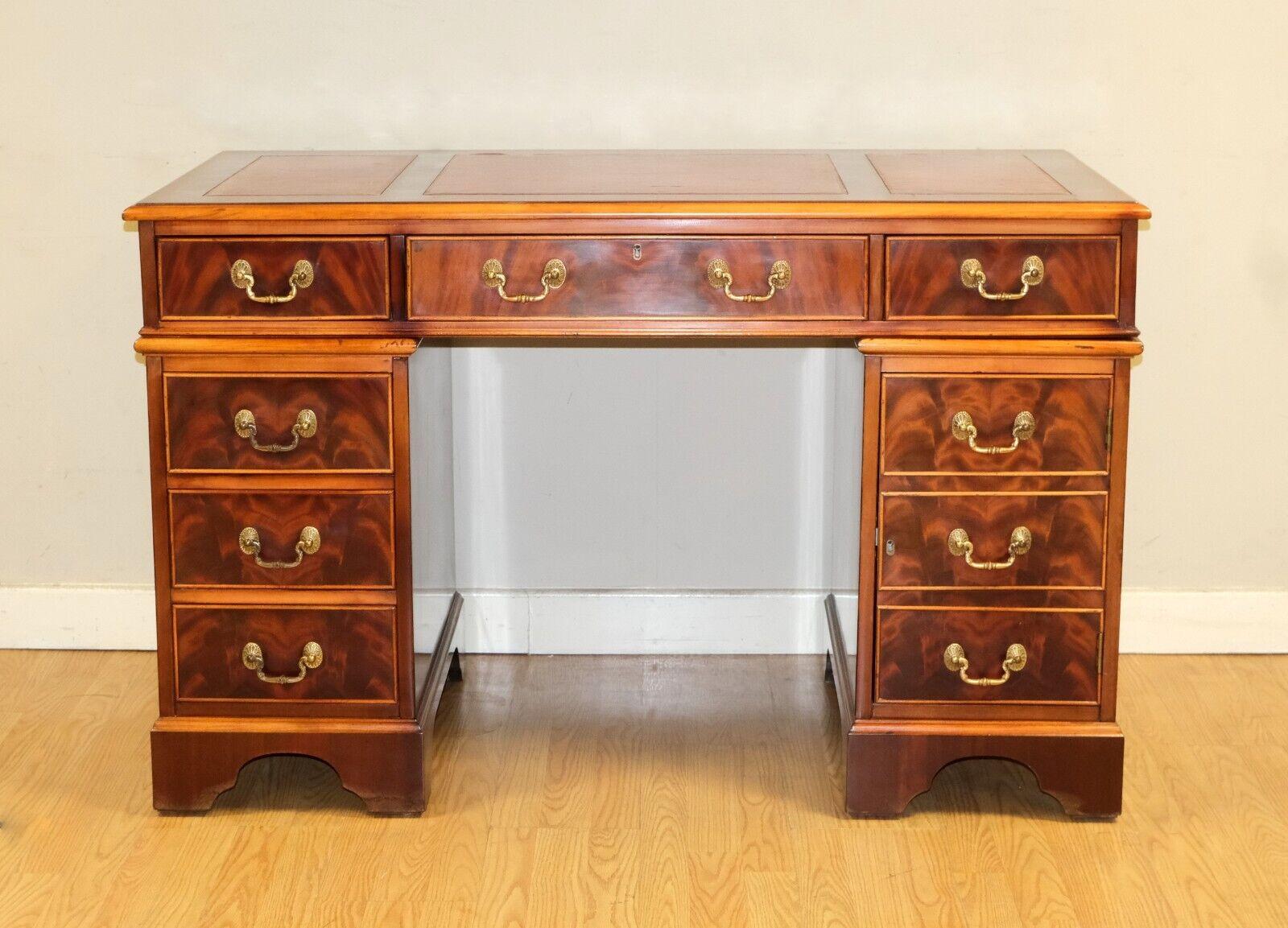 English LATE 20TH C WARING & GILLOW PEDESTAL DESK WiTH GOLD TOOLED RED LEATHER TOP  For Sale