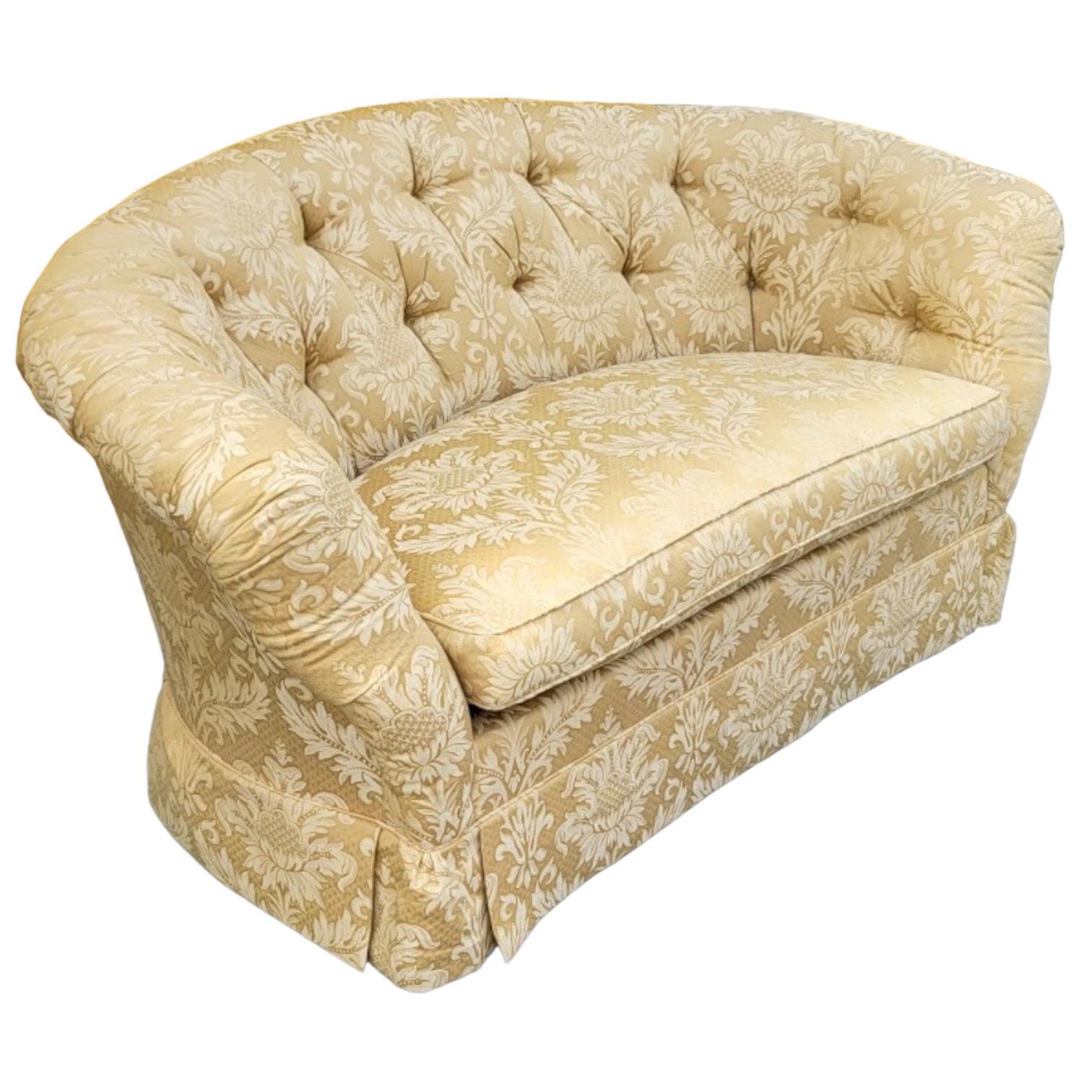 This is a butter yellow damask sofa or settee by Baker Furniture Company. It is in very good condition, and it is marked. The cushion is a down wrap. The piece dates to the later part of the 20th century.

My shipping is running two to five weeks