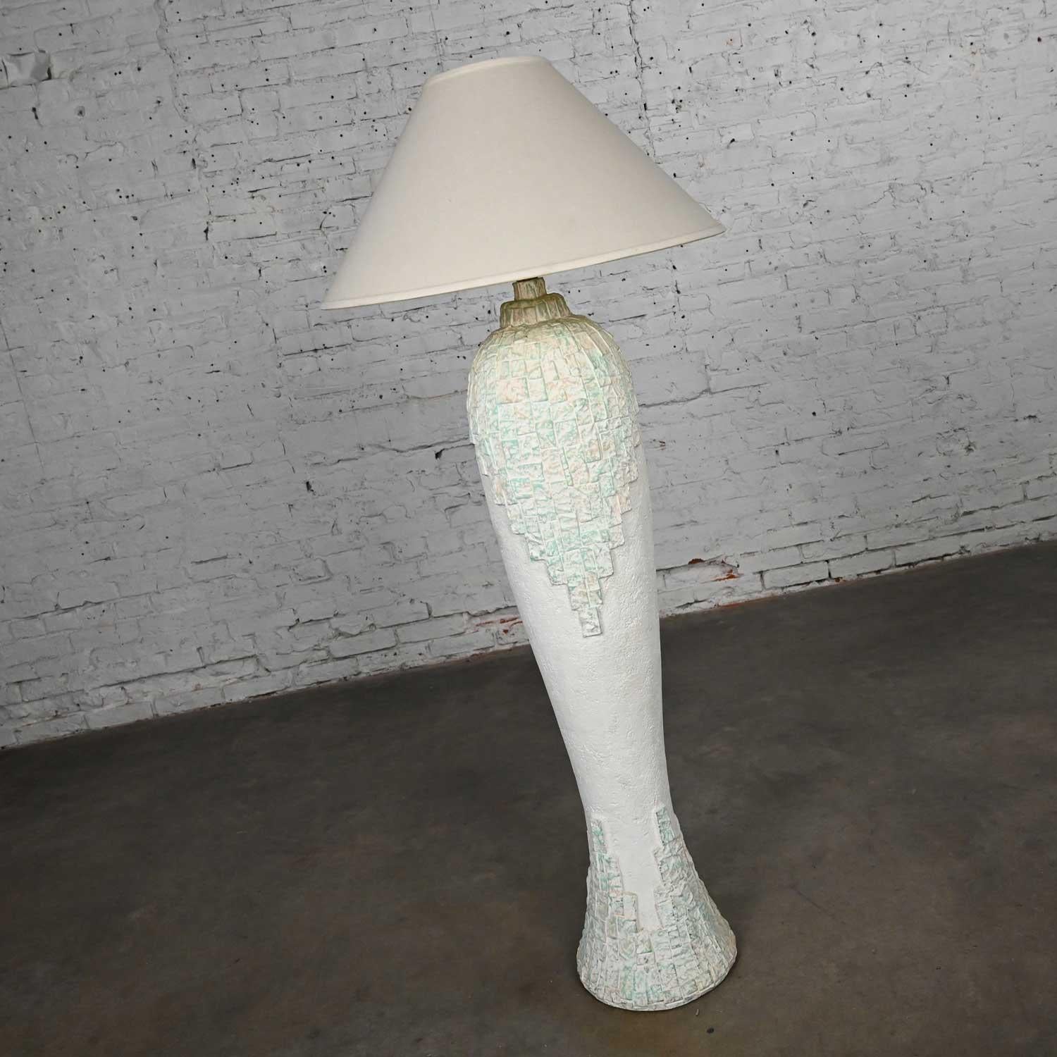 Incredible vintage modern to postmodern southwest style textured sculptural plaster floor lamp with its original beige linen-like coolie shade. Beautiful condition, keeping in mind that this is vintage and not new so will have signs of use and wear.