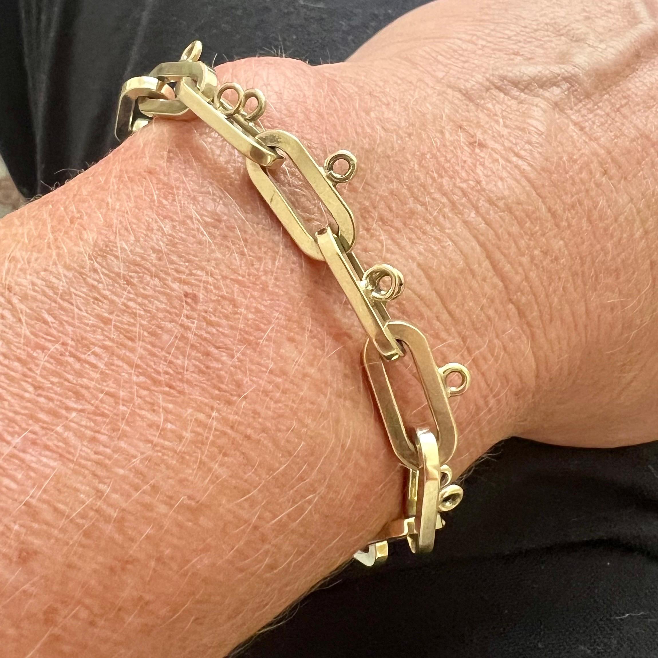 Fin du 20ème siècle, bracelet à breloques en or 14 carats, 25.64 grammes Bon état - En vente à Rotterdam, NL