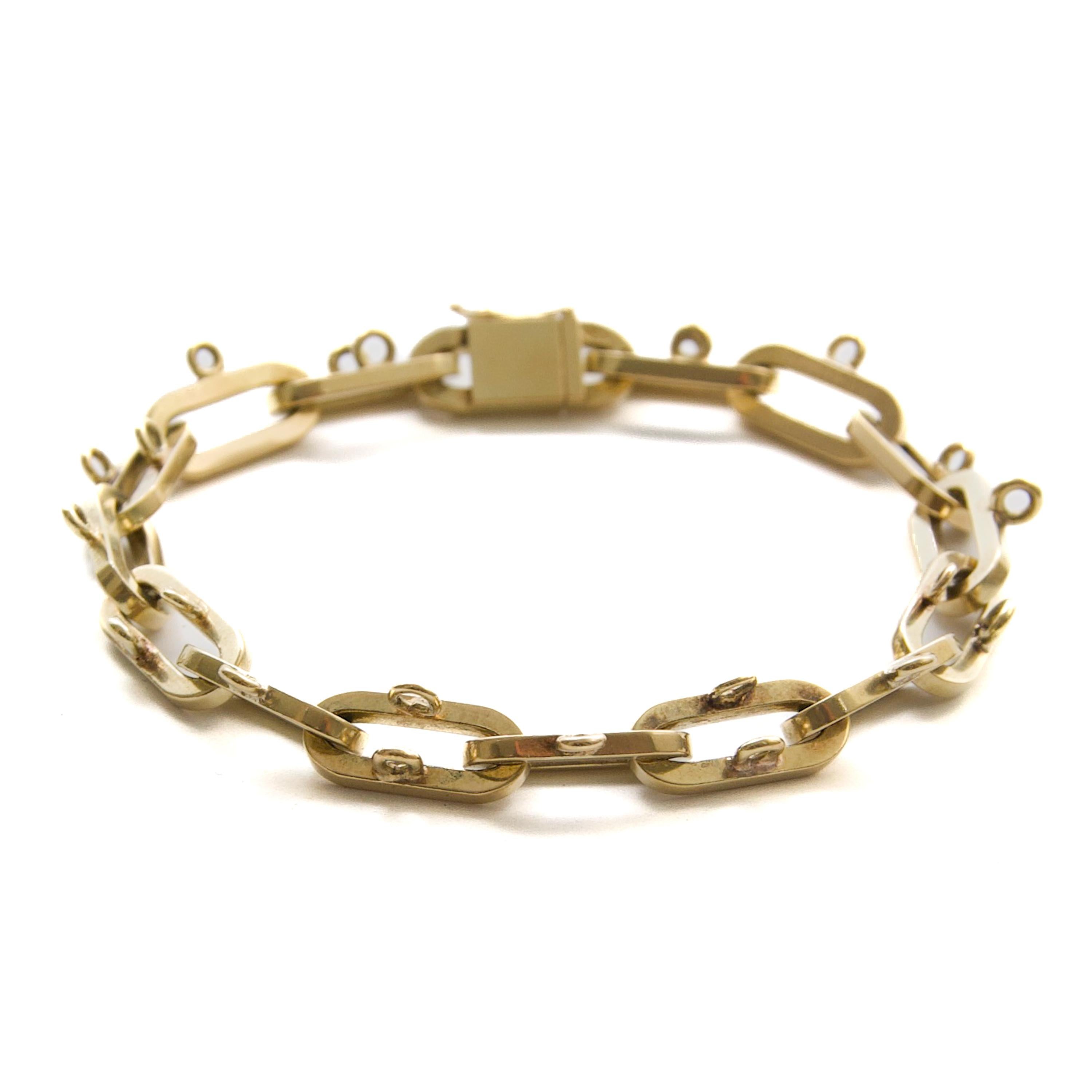 Fin du 20ème siècle, bracelet à breloques en or 14 carats, 25.64 grammes Pour femmes en vente