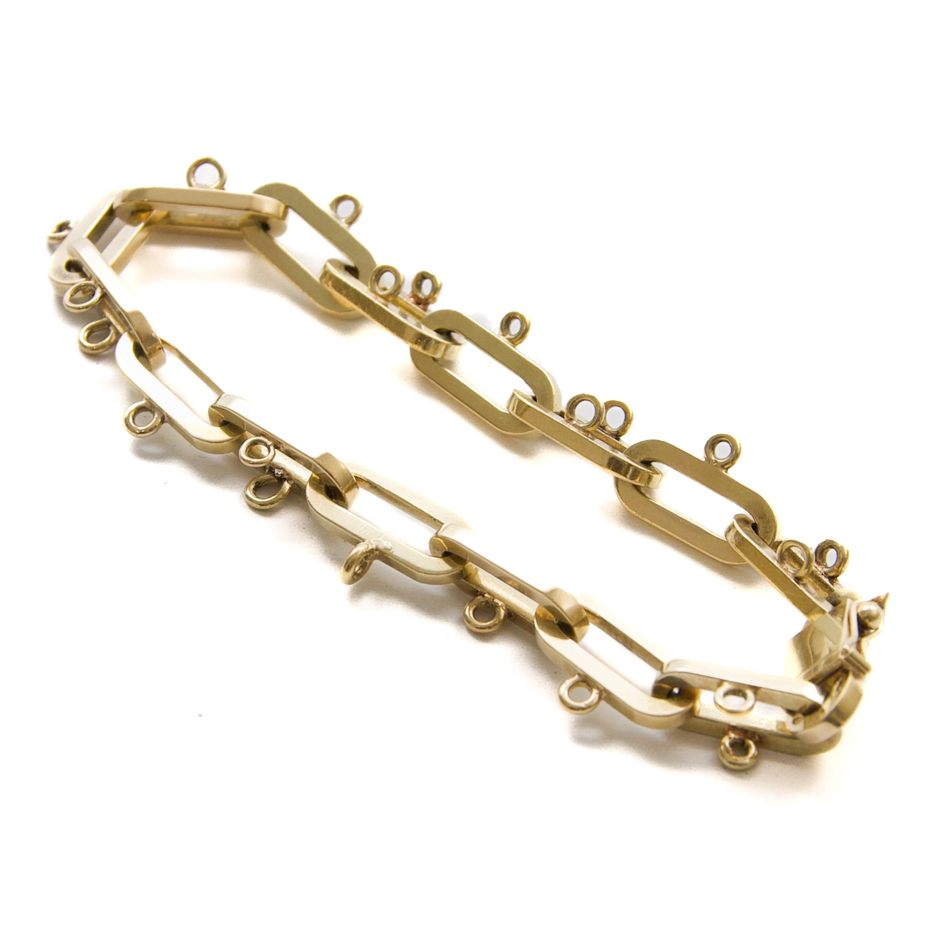 Fin du 20ème siècle, bracelet à breloques en or 14 carats, 25.64 grammes en vente 1