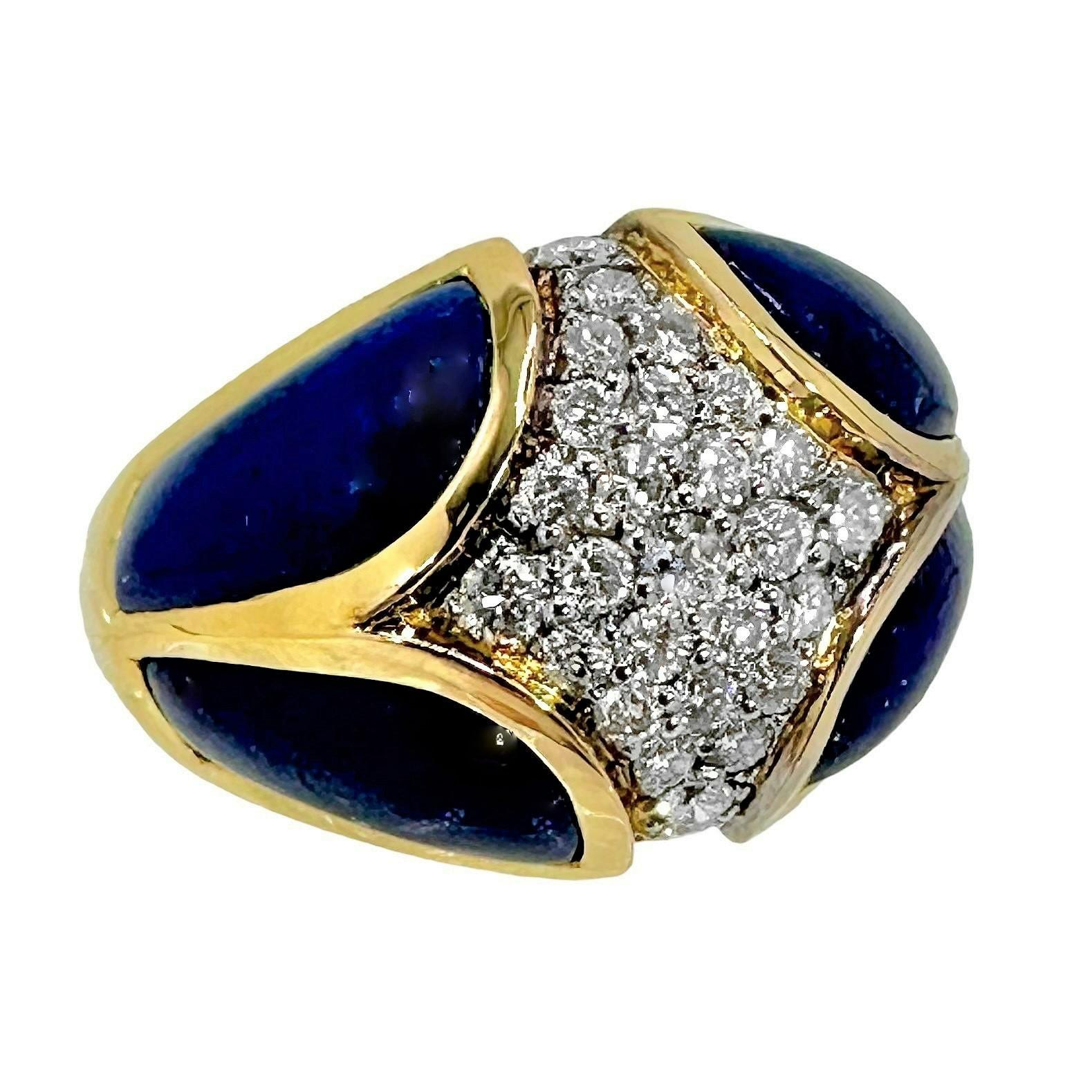 This very interesting and tailored ladies fashion ring was created at some time during the 1970's. It is constructed with the finest materials and with much attention paid to detail. A center white gold, heavily diamond encrusted dome is cradled at