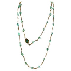 Late 20th Century 22-Karat Polished Emerald 40 Inch Link Necklace.